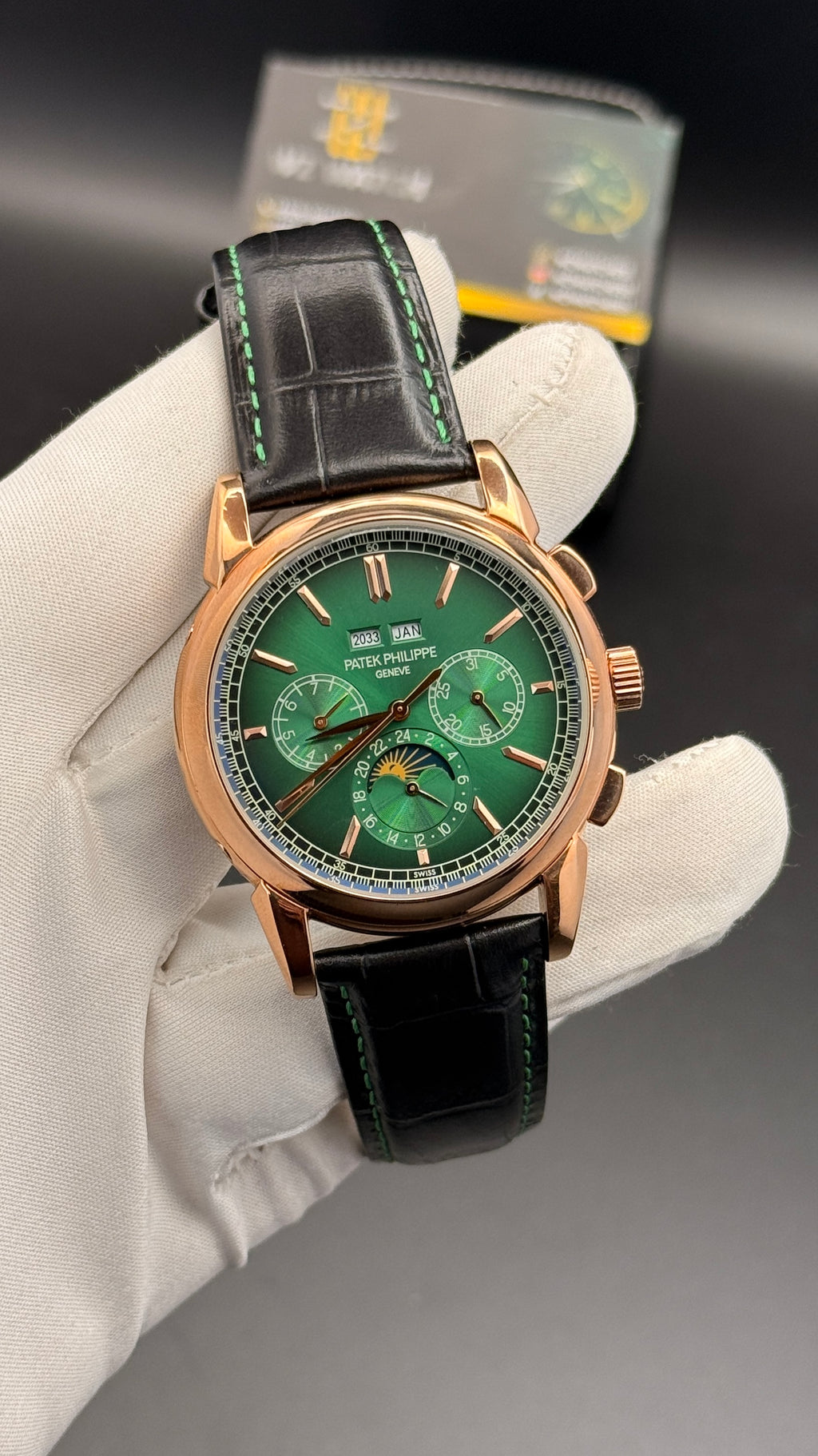 Rose gold with green Dial.