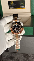 Rose gold two tone with  black Dial.
