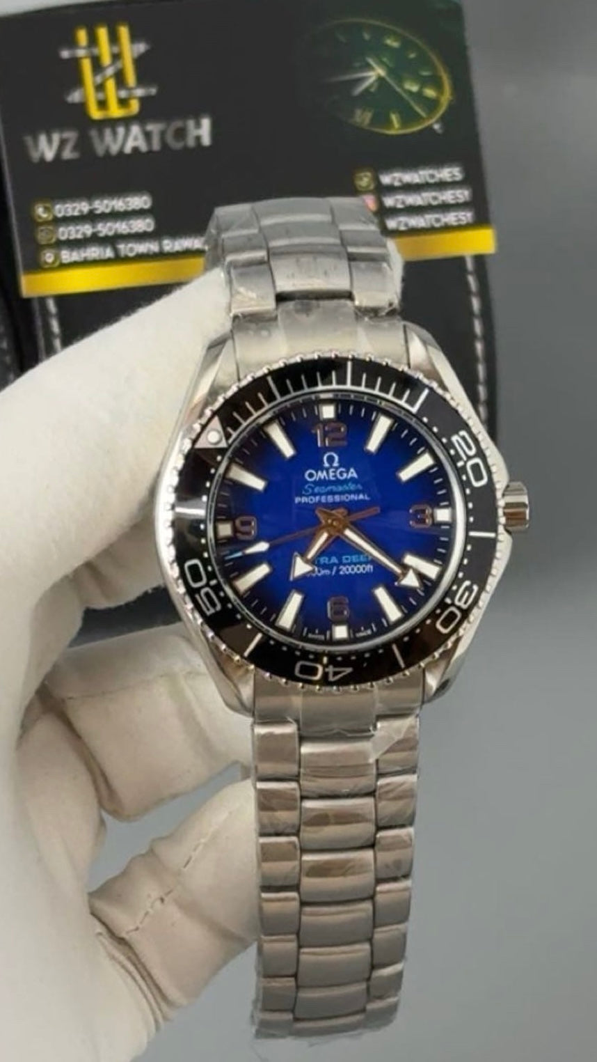 Silver with blue Dial.