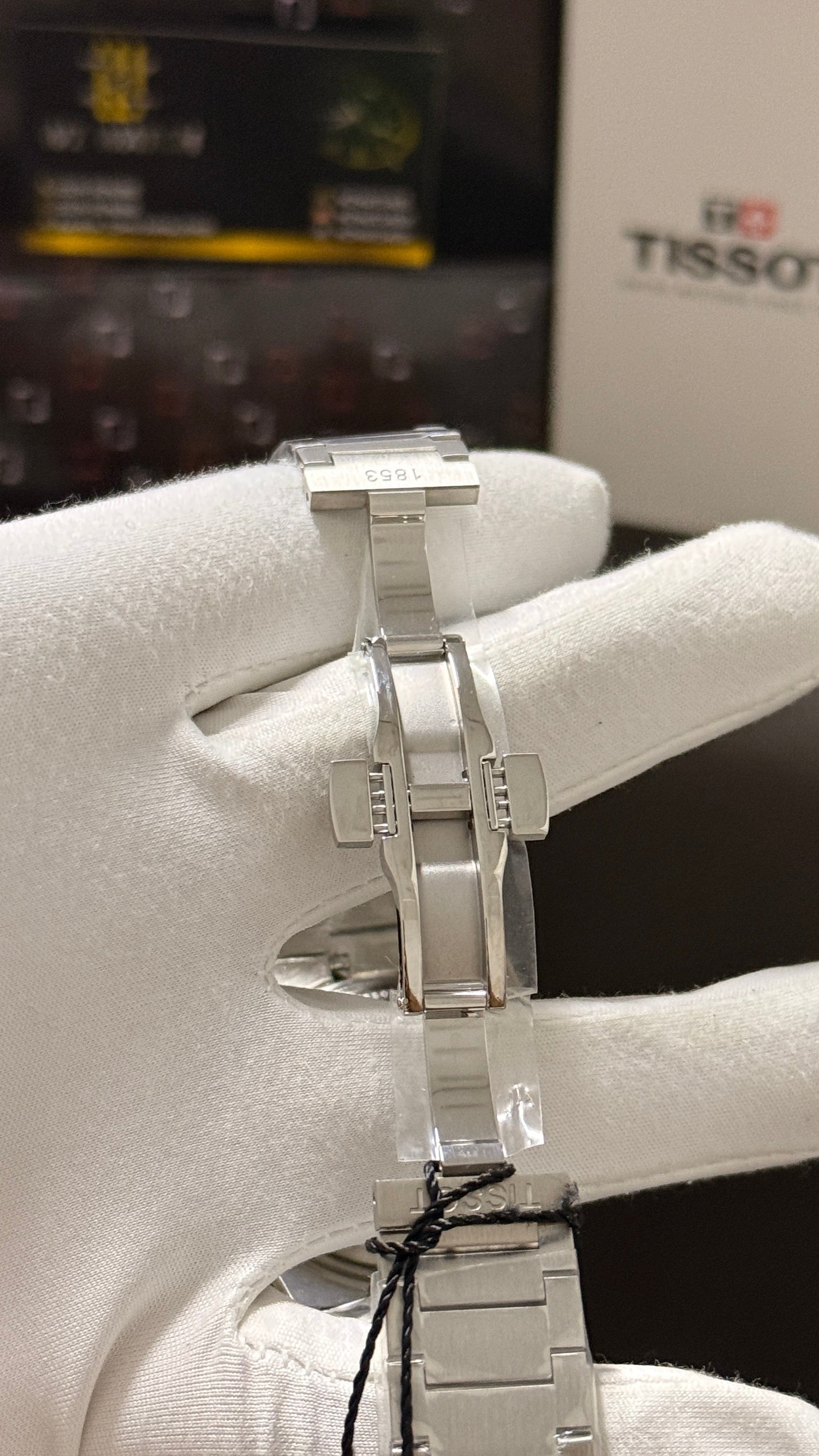 Silver with blue dial