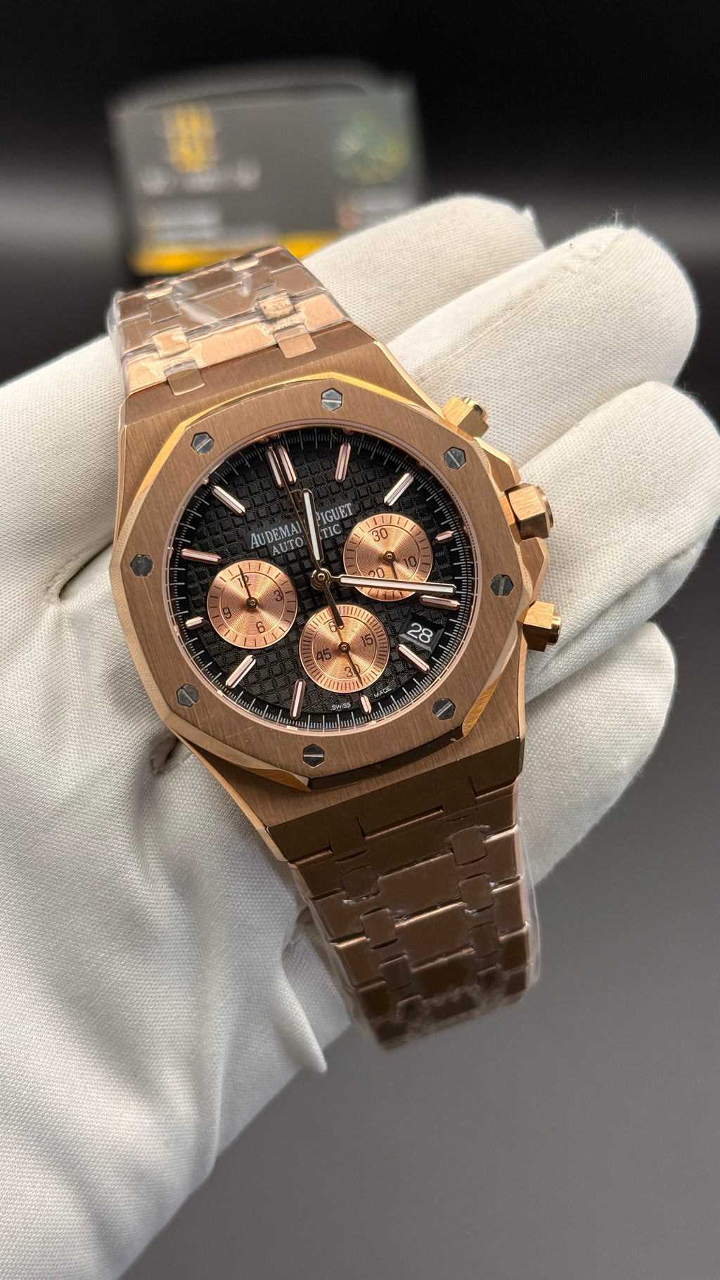 Rose gold with black Dial.