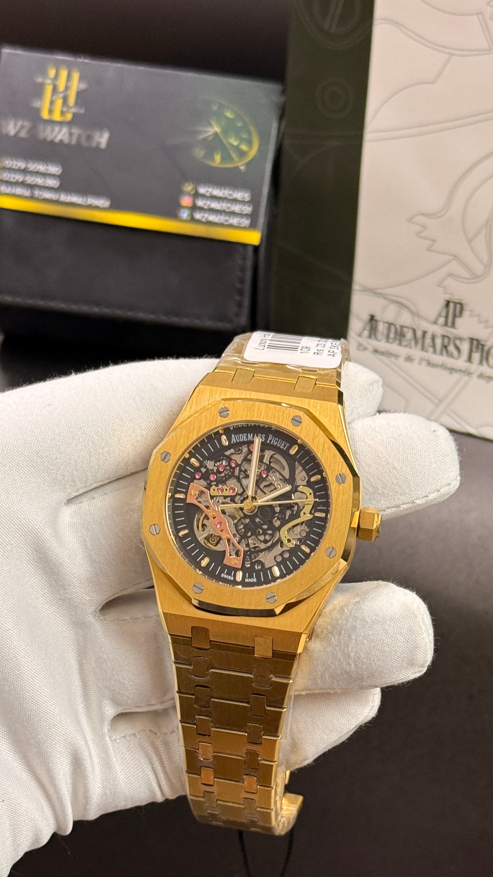 Yellow gold with black skeleton dial