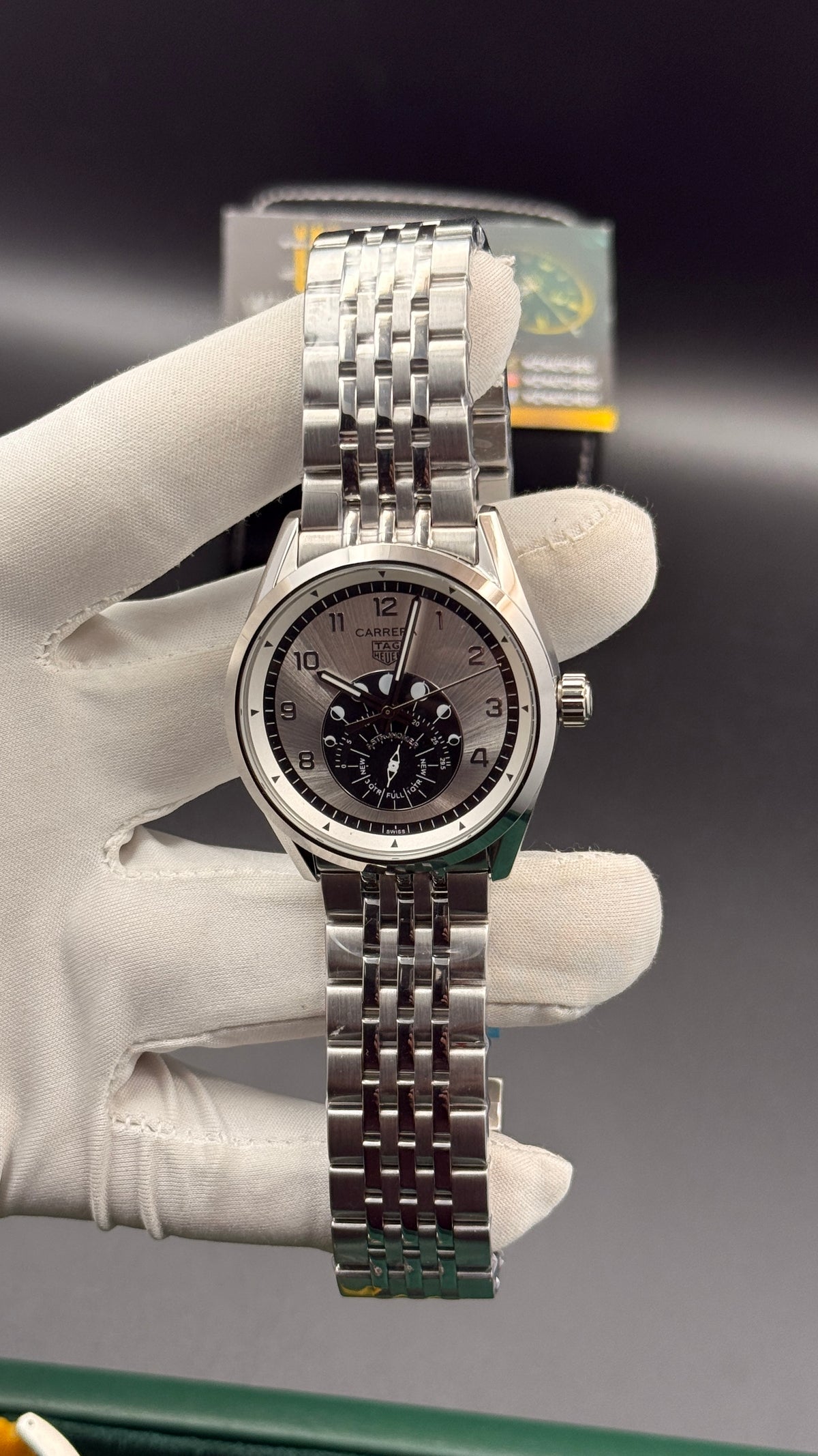 Silver with white Dial.