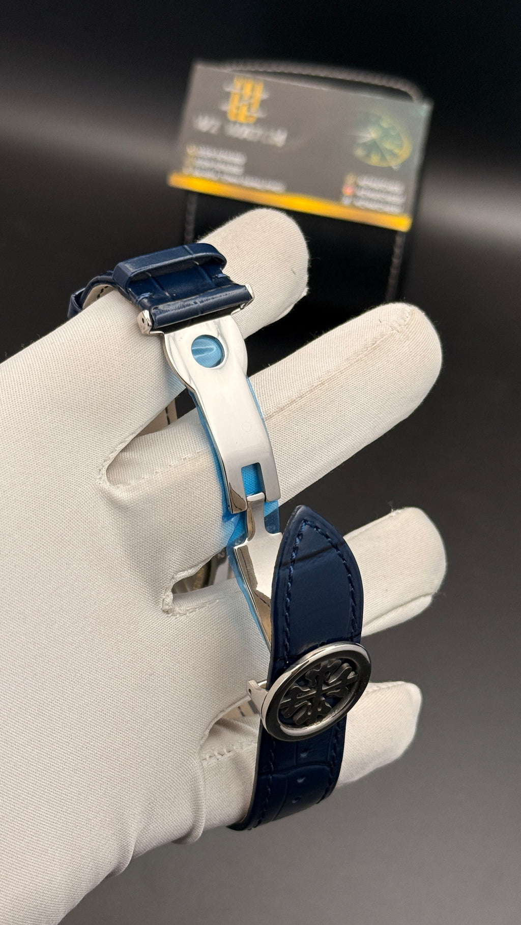 Silver with blue Dial.