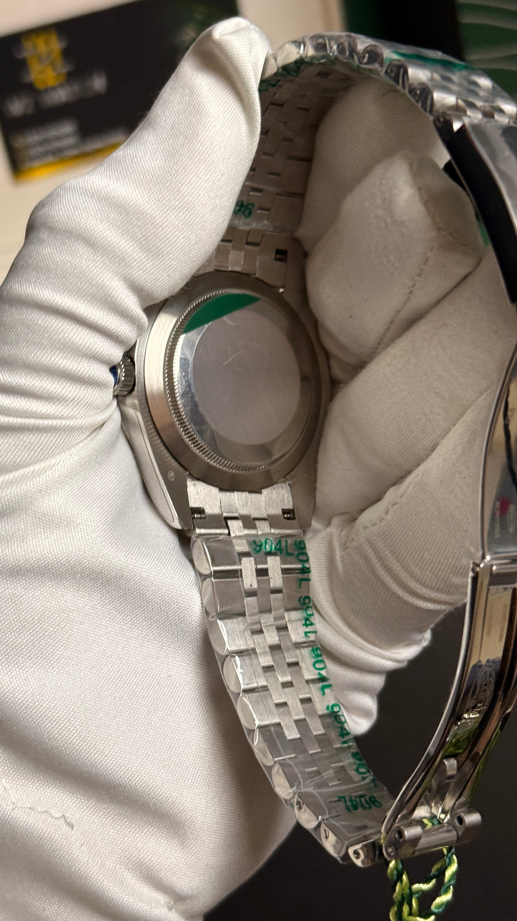 Silver with green Dial.