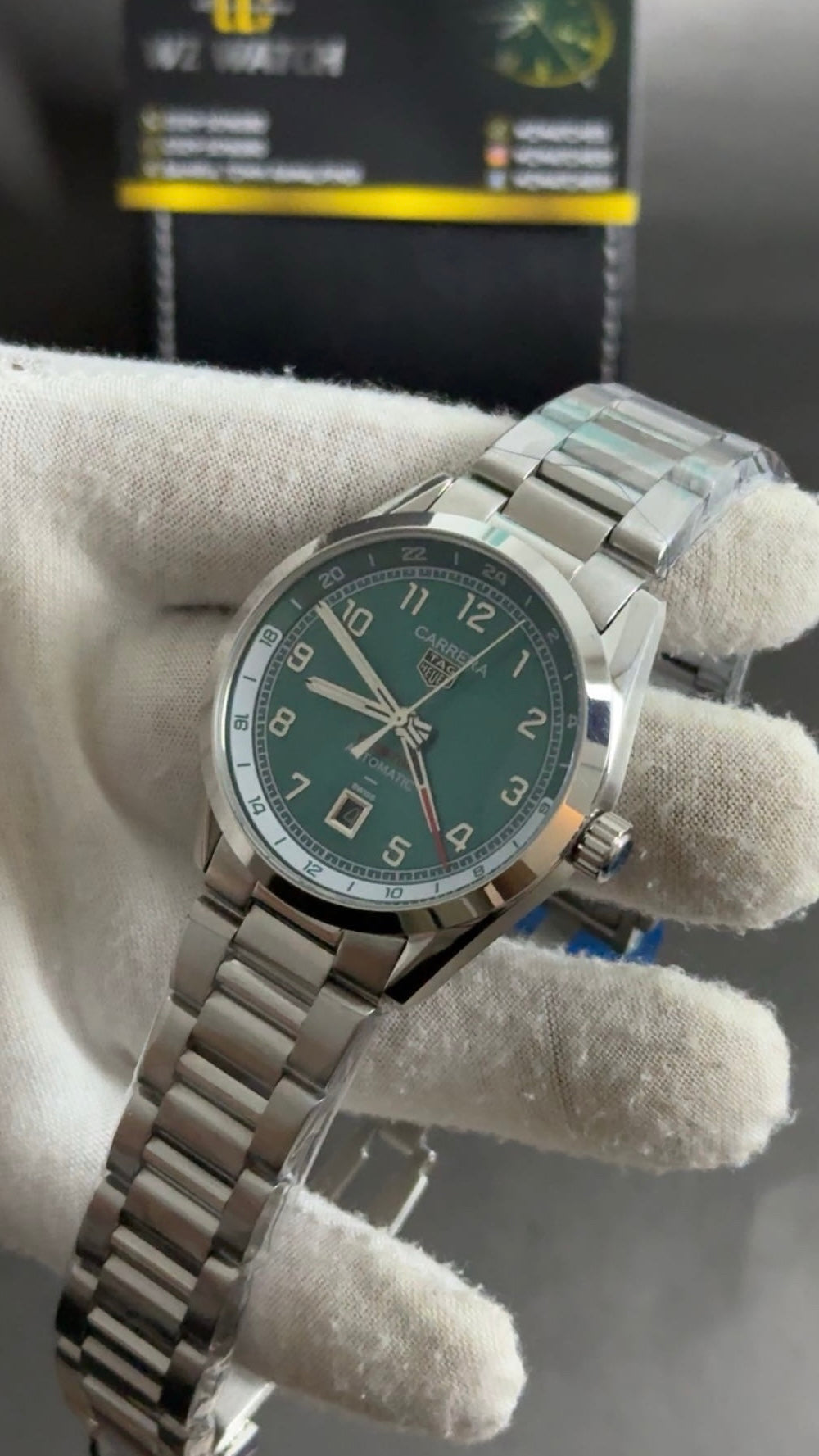 Silver with green Dial