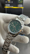 Silver with green Dial