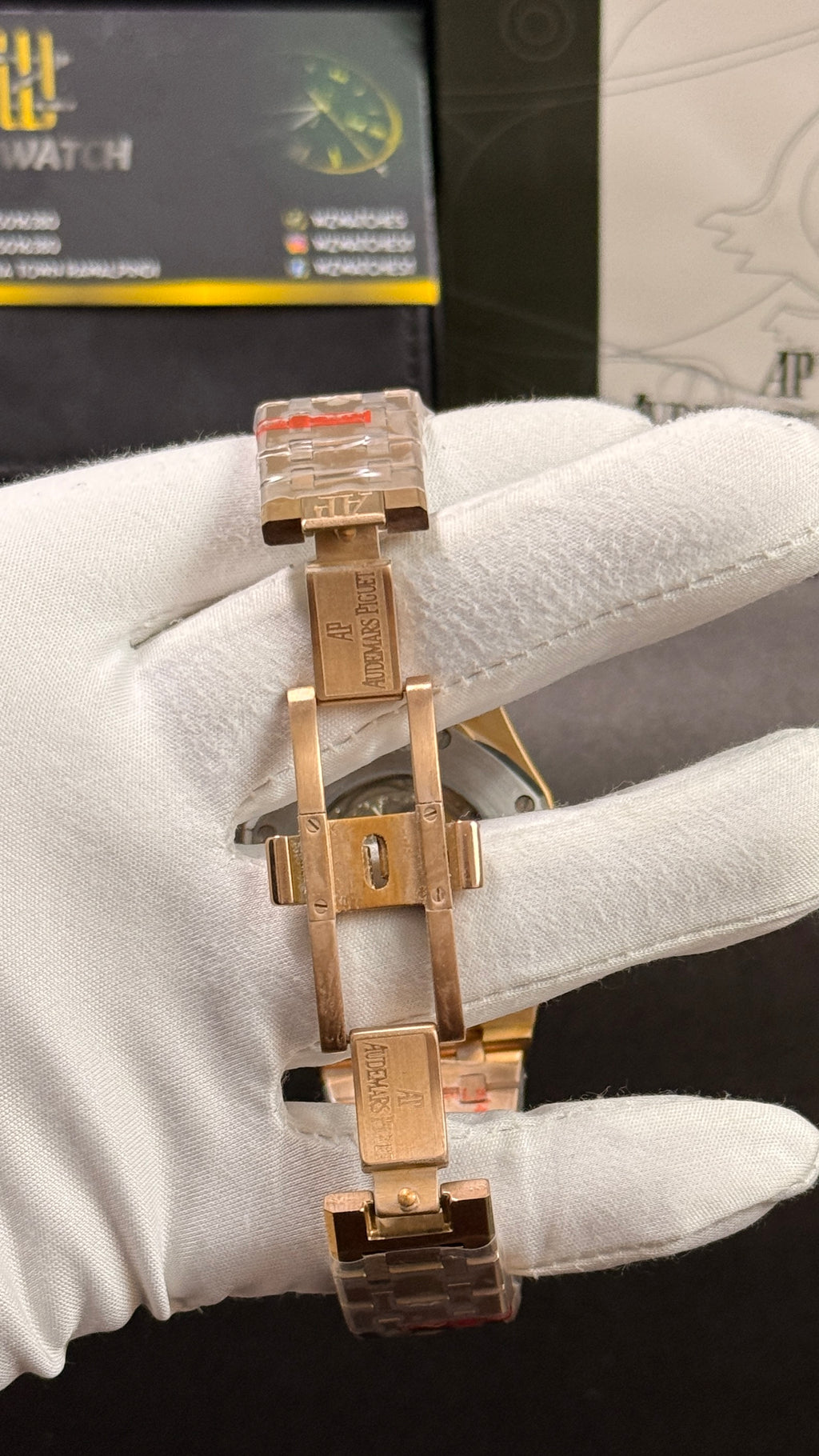 Rose gold with black skeleton dial