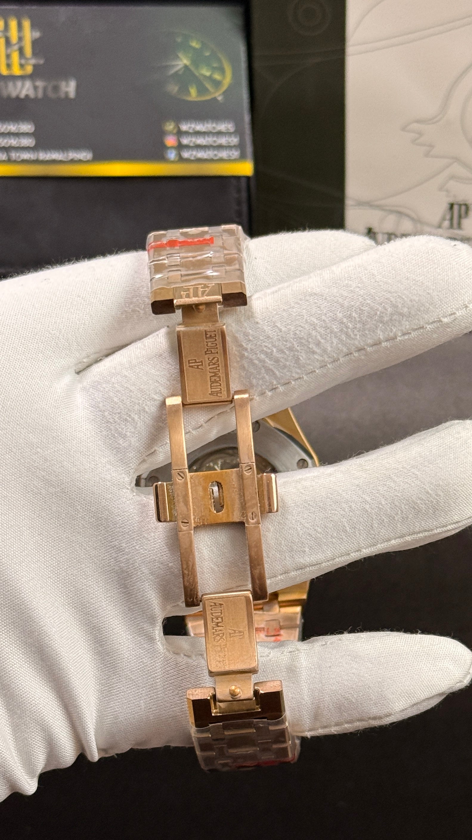 Rose gold with black skeleton dial