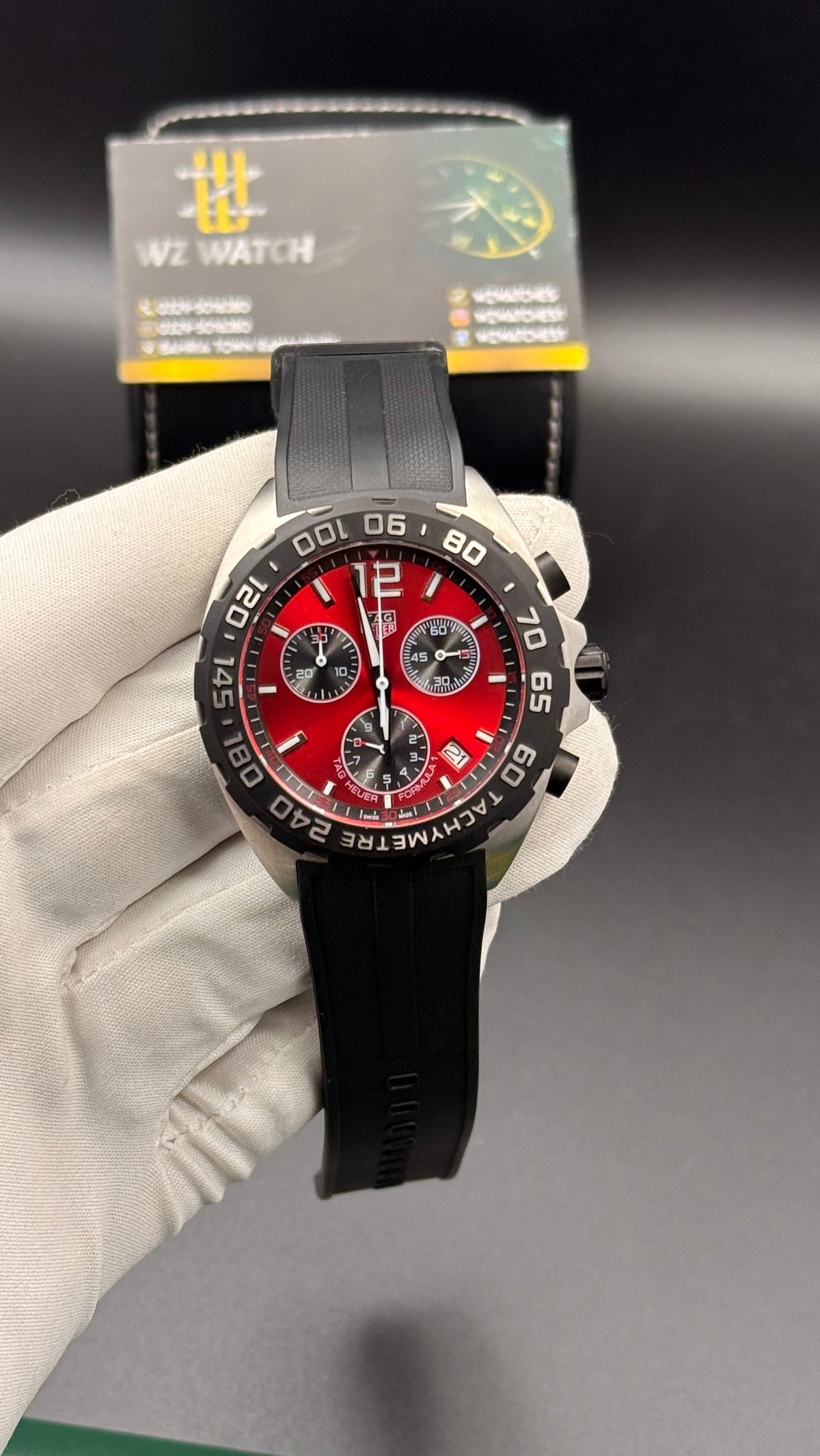 Silver with maroon Dial.