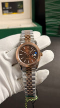 Rose gold two tone withchocolate Dial.