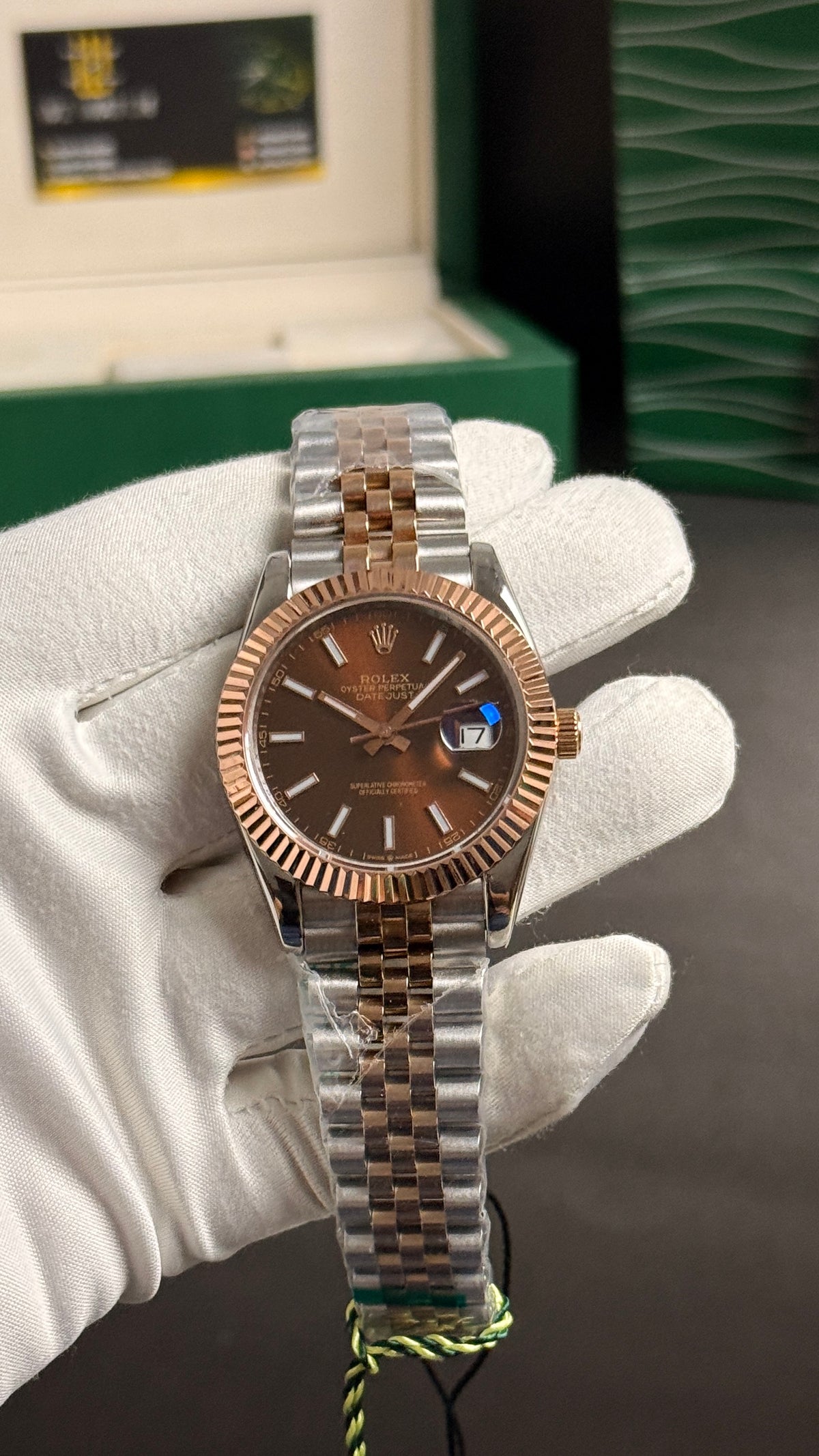 Rose gold two tone withchocolate Dial.