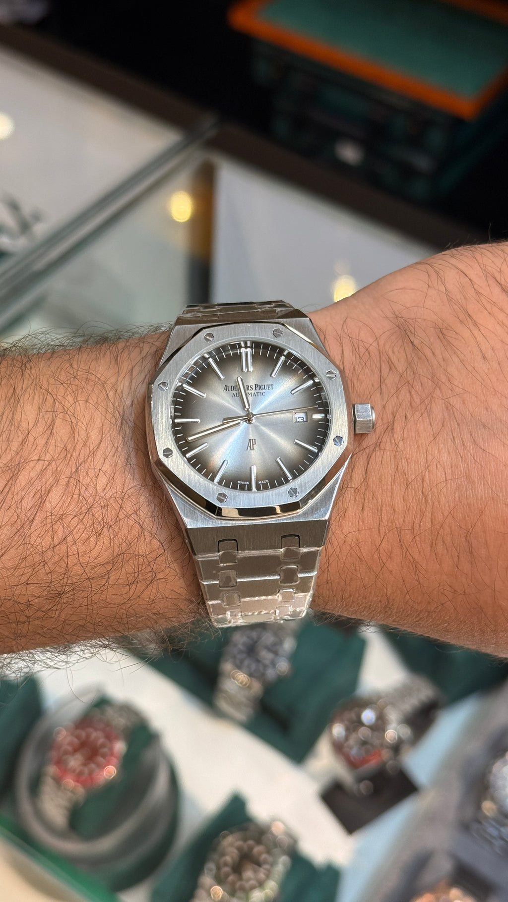 Silver with grey Dial.