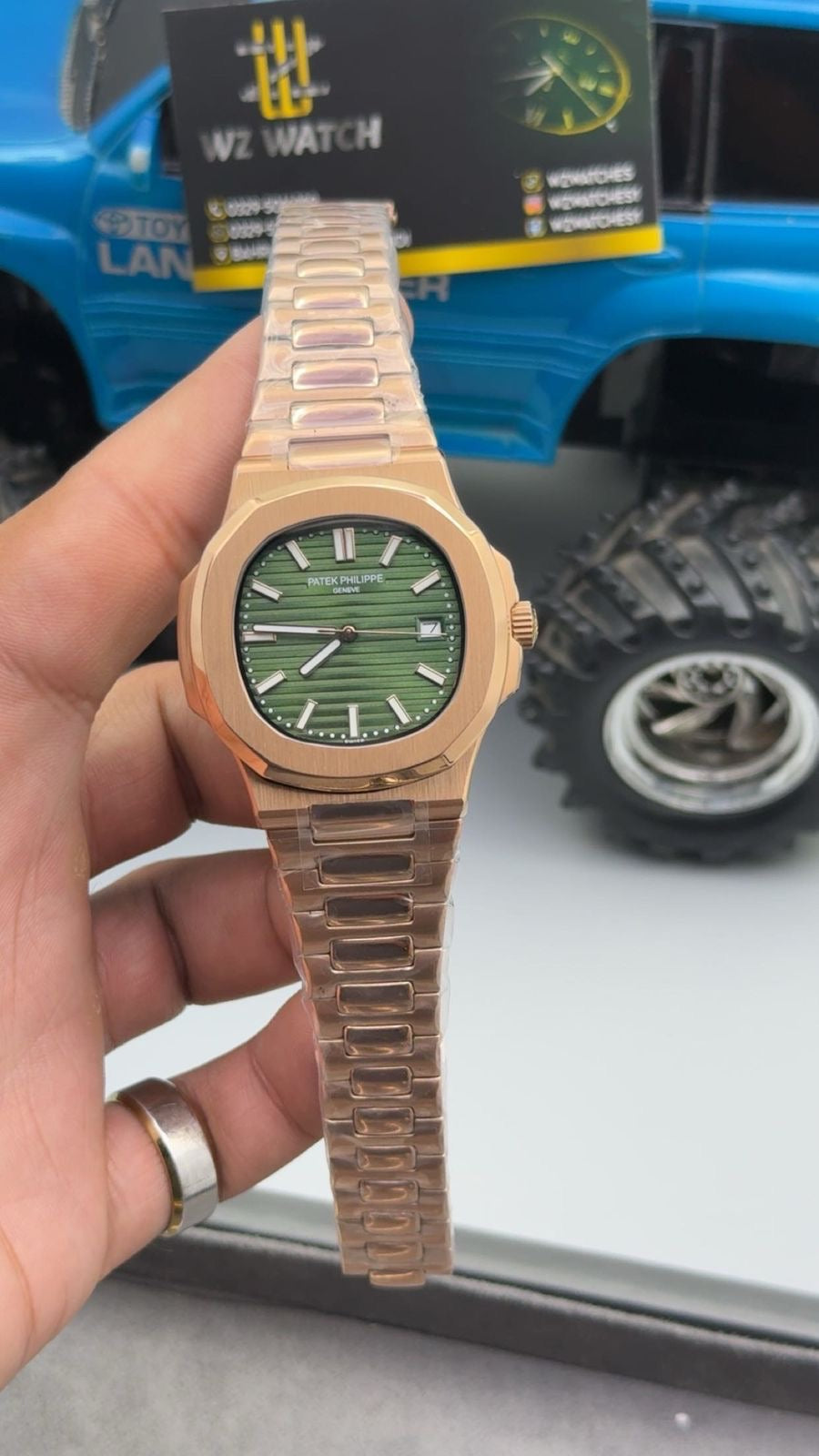 Rose gold  with green Dial.