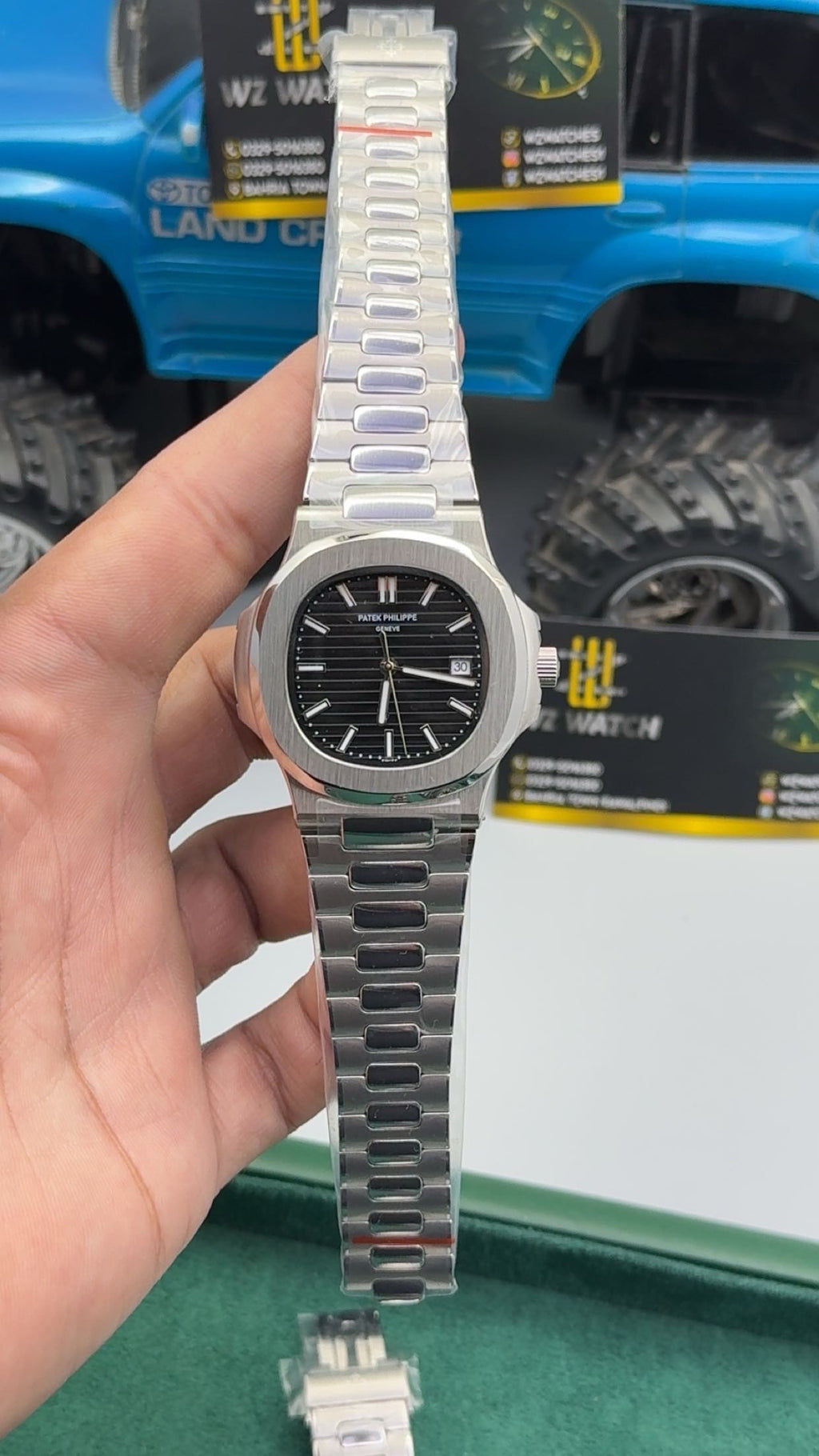 Silver with black Dial.