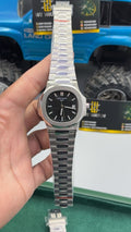 Silver with black Dial.