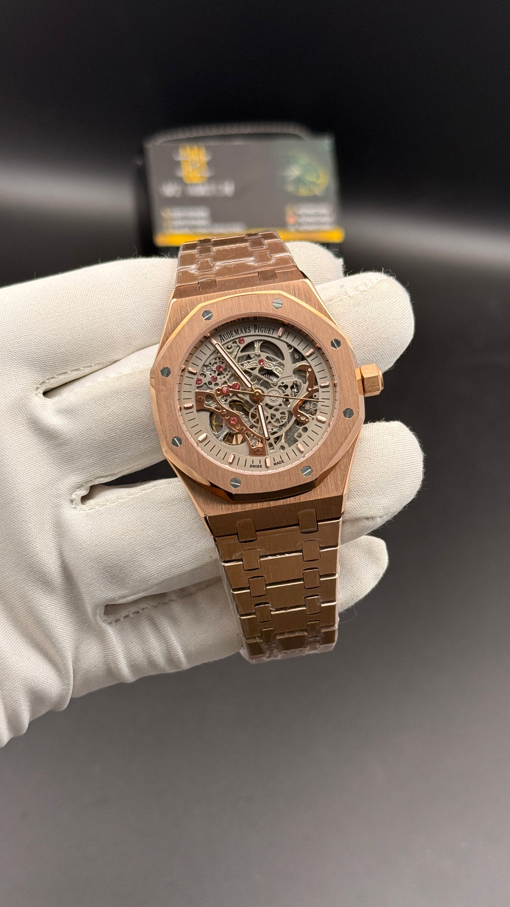 Rose gold with white  skeleton Dial.