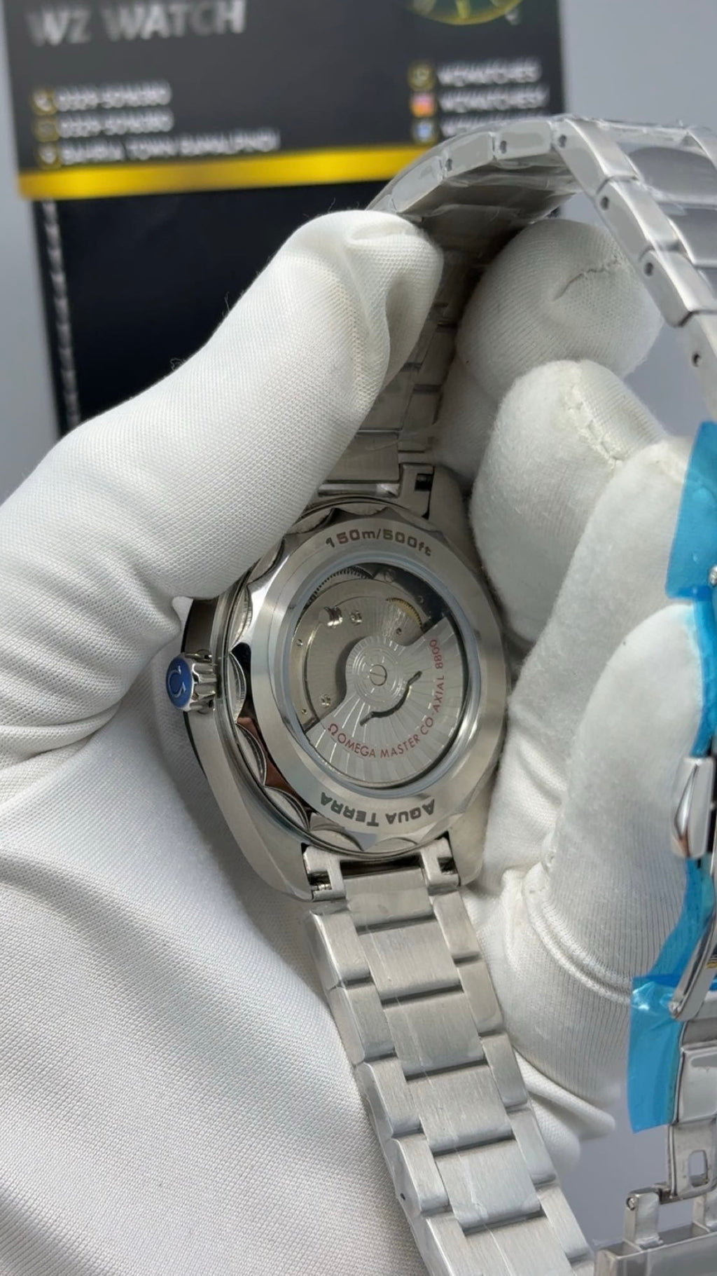 Silver with green Dial.