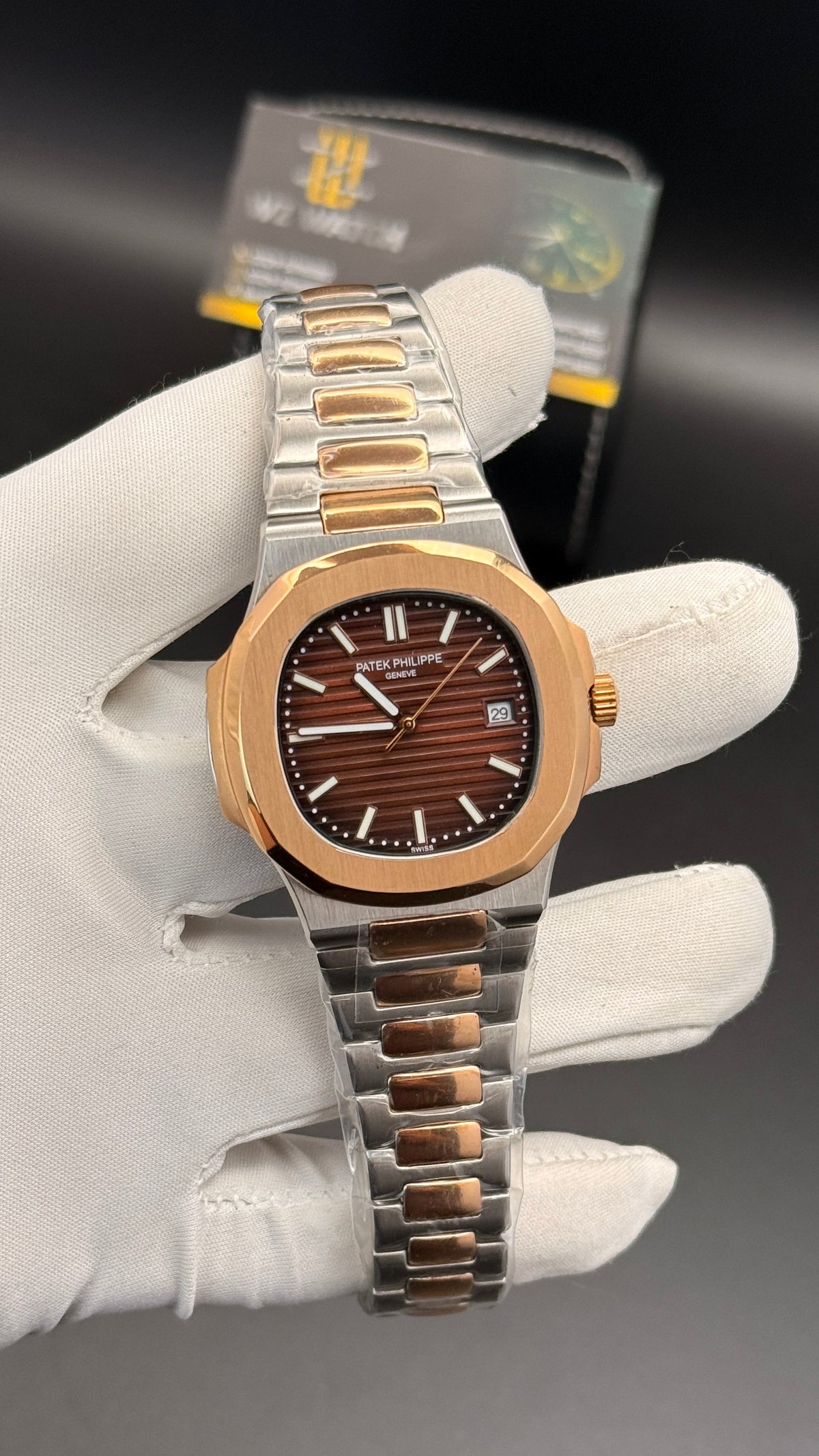 Rose gold two tone with chocolate Dial.