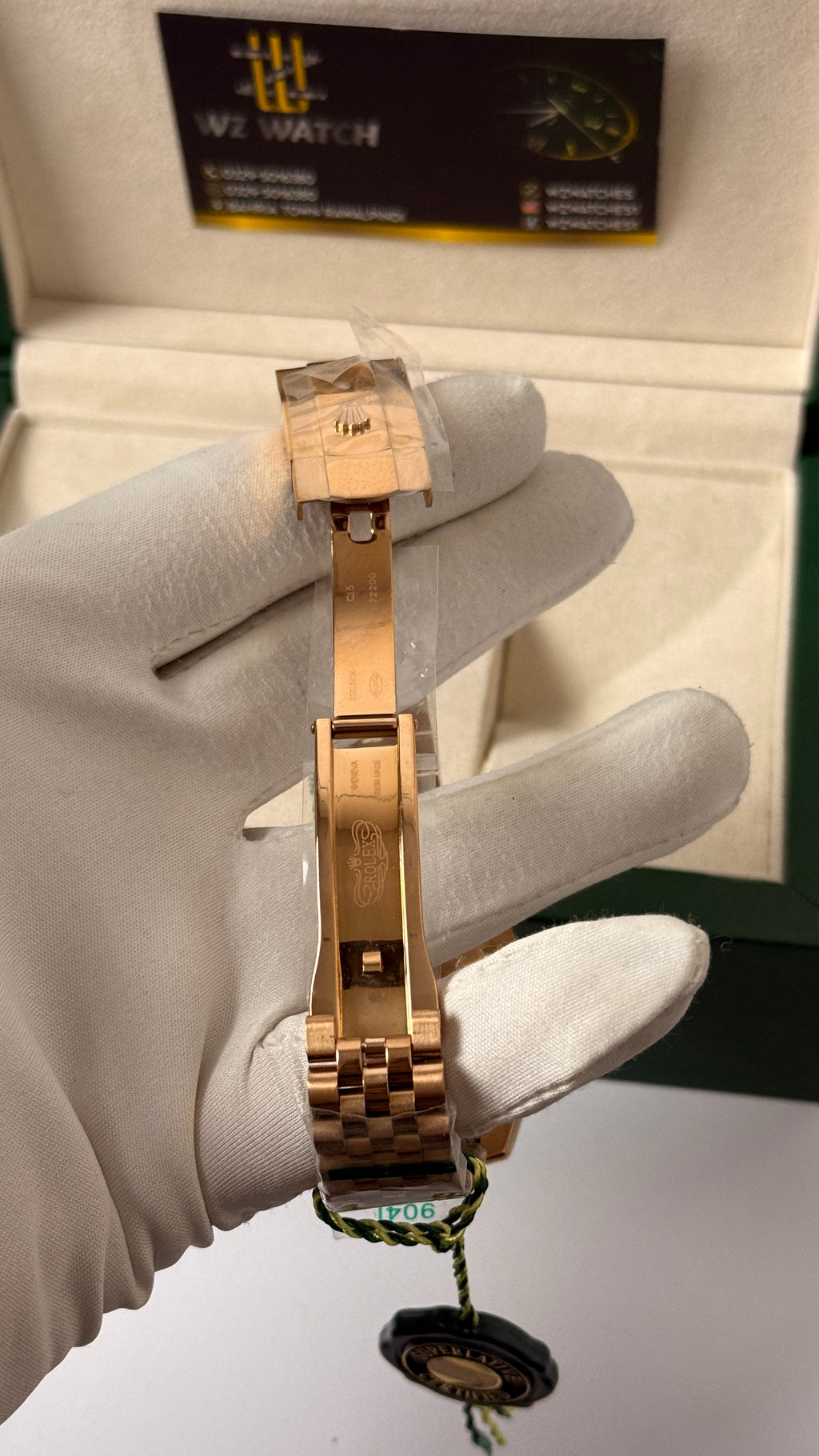 Rose gold with aqua Dial.