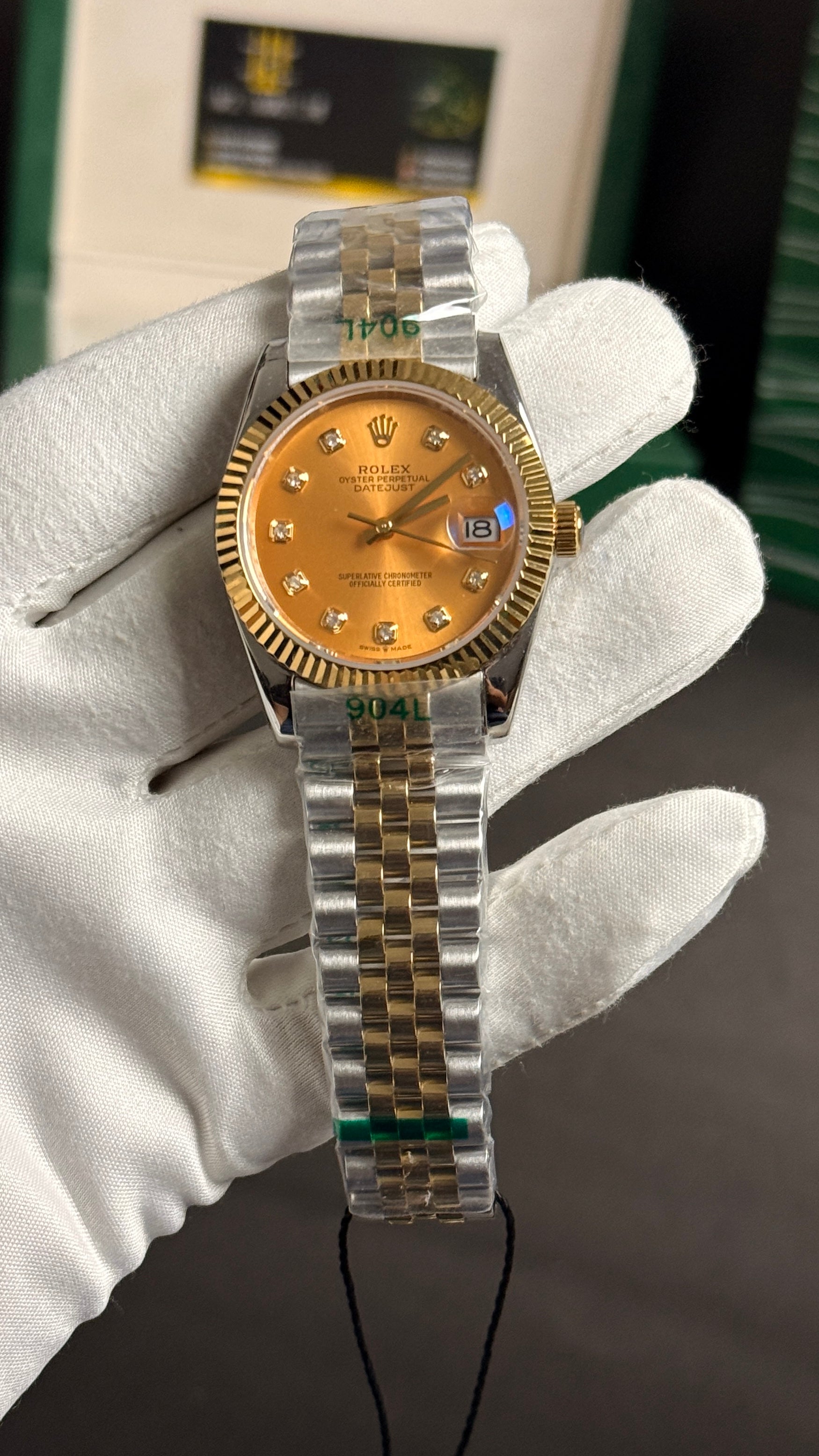 (36 mm) Yellow gold tow tone with Beauty Dial.