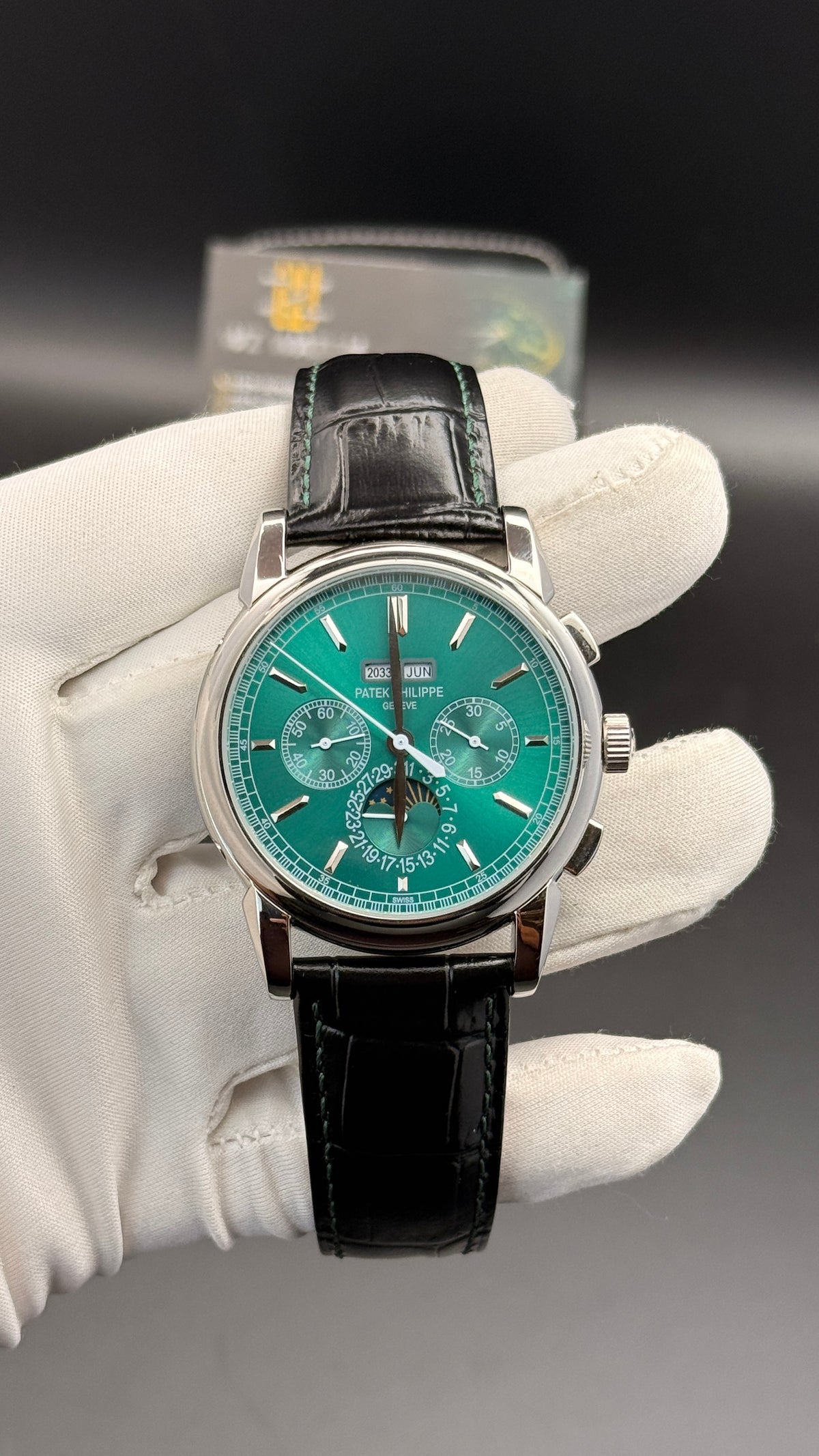 Silver with green Dial.