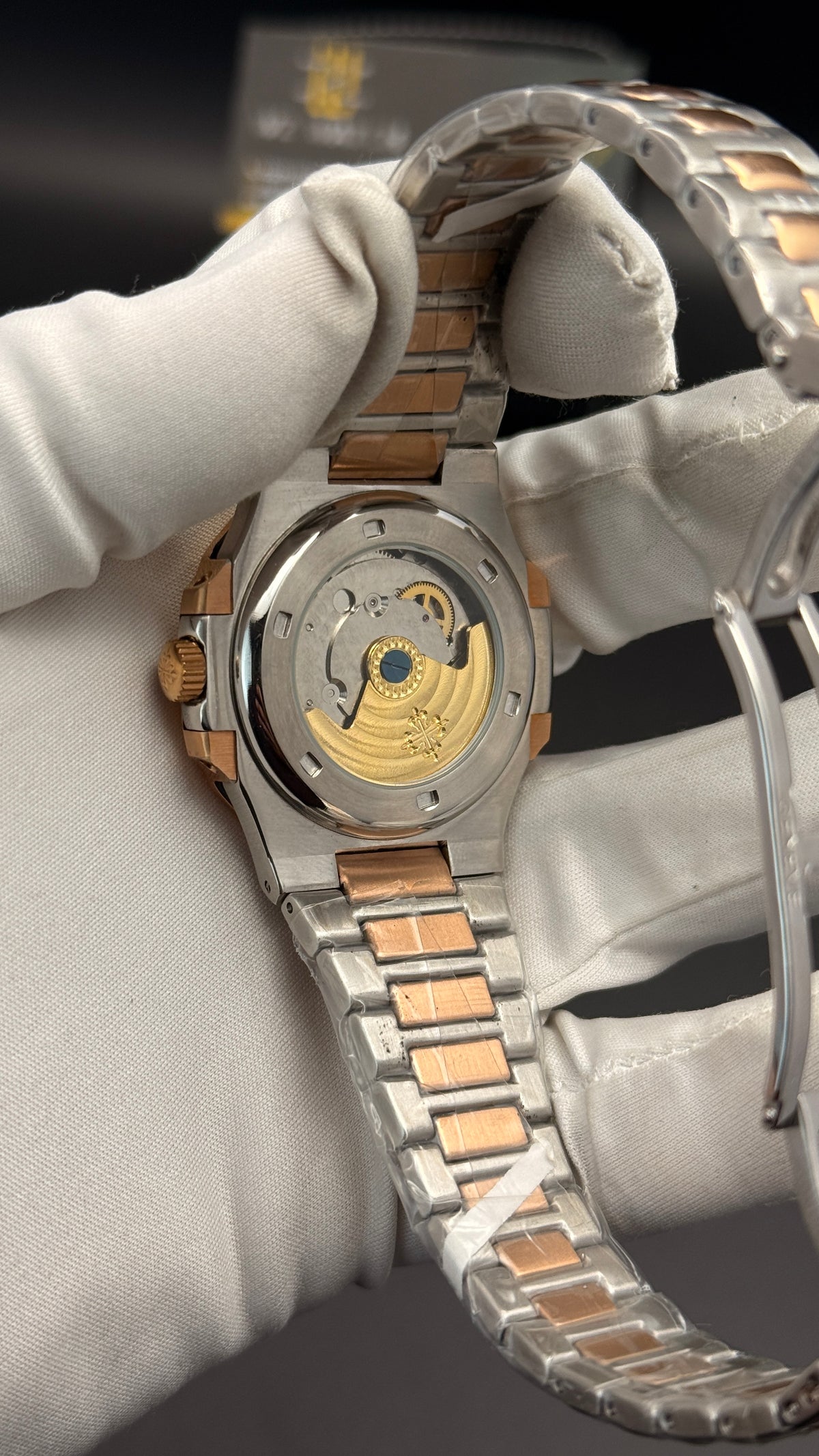 Rose gold two tone with chocolate Dial.