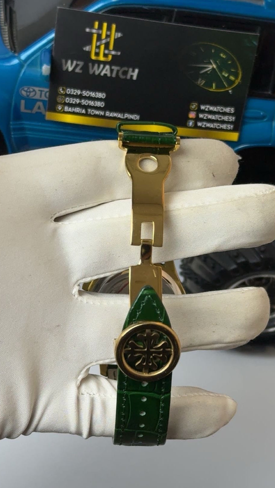Gold with green Dial.