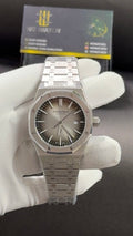 Silver with grey dial