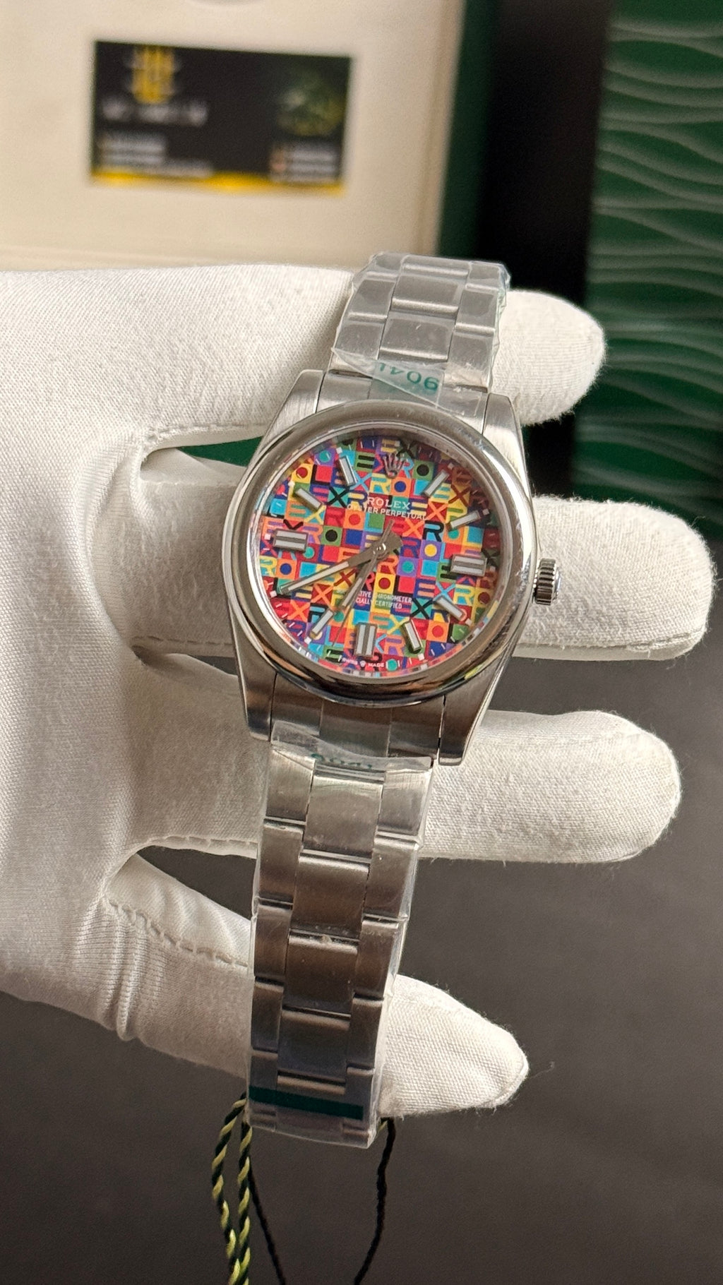 Silver with Rainbow Dial.