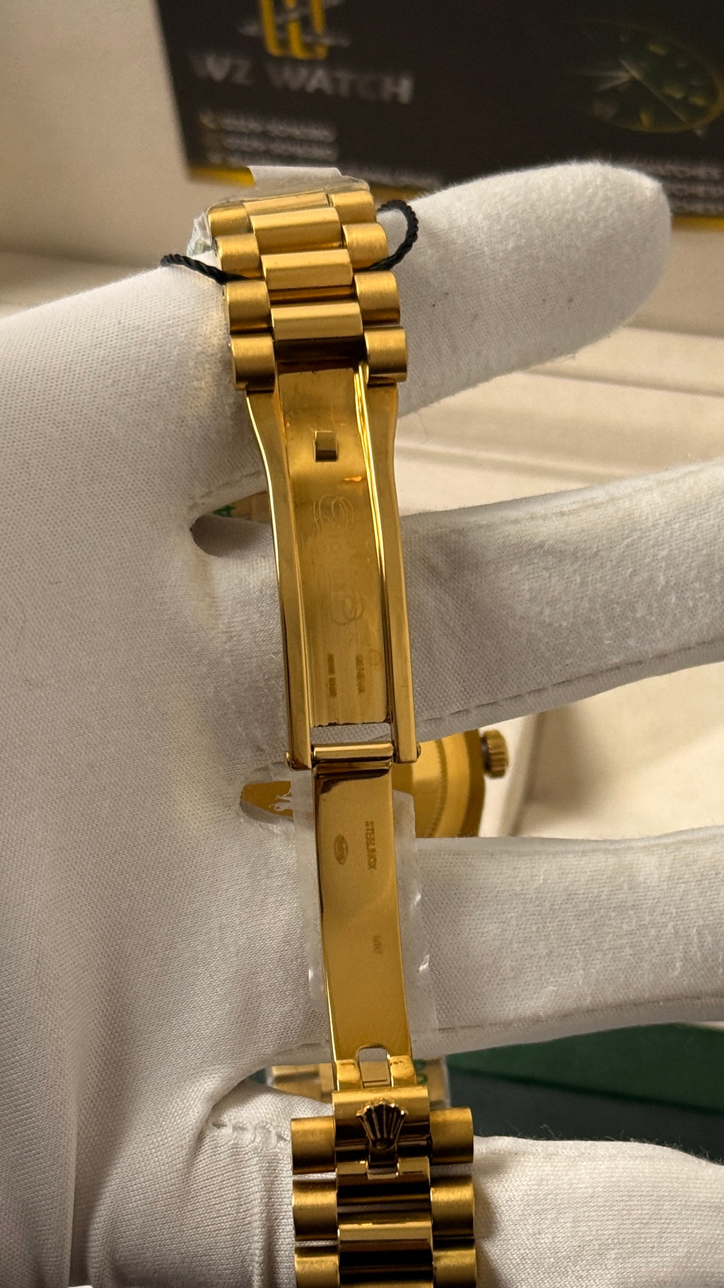 Yellow Gold with  Green Dial.