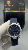 Silver with blue Dial.