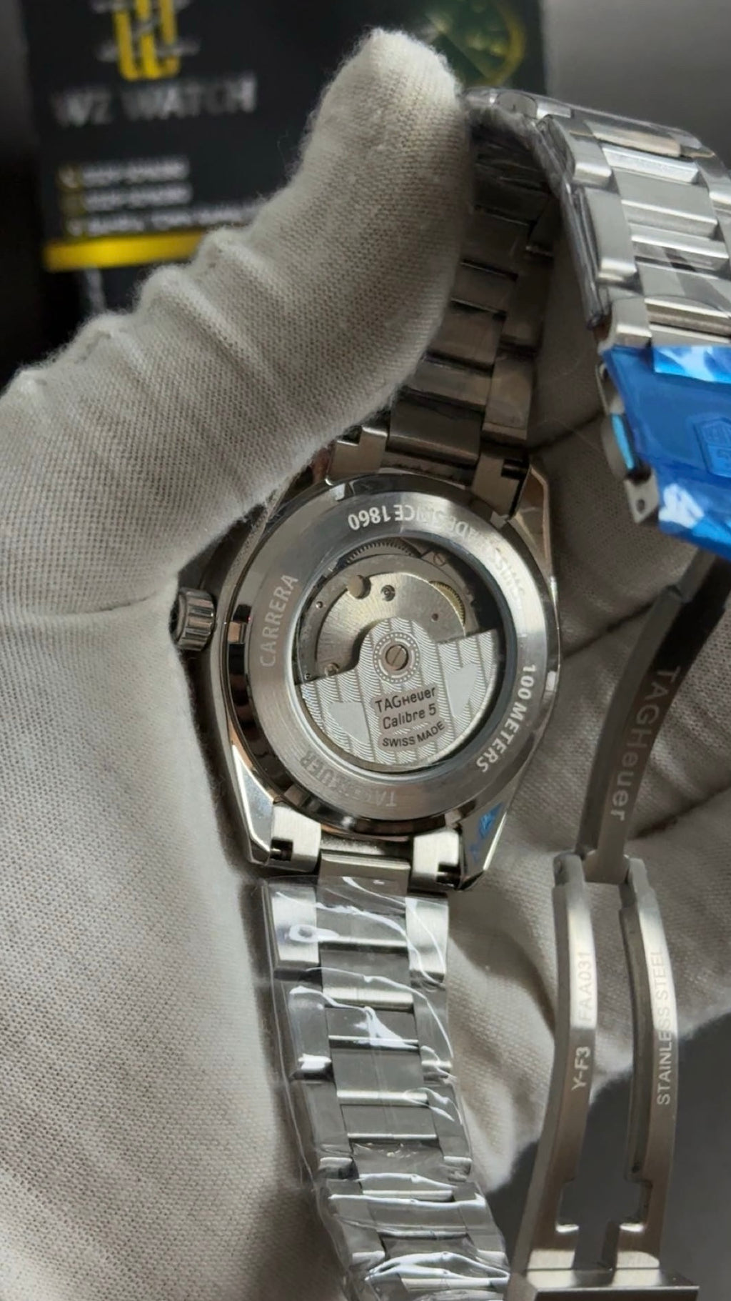 Silver with green Dial
