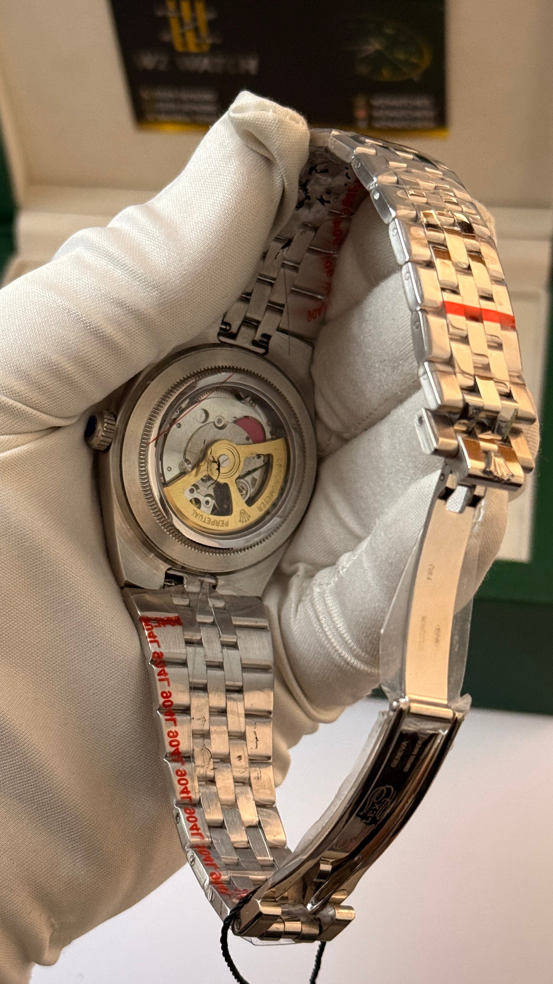 Silver with grey Dial.