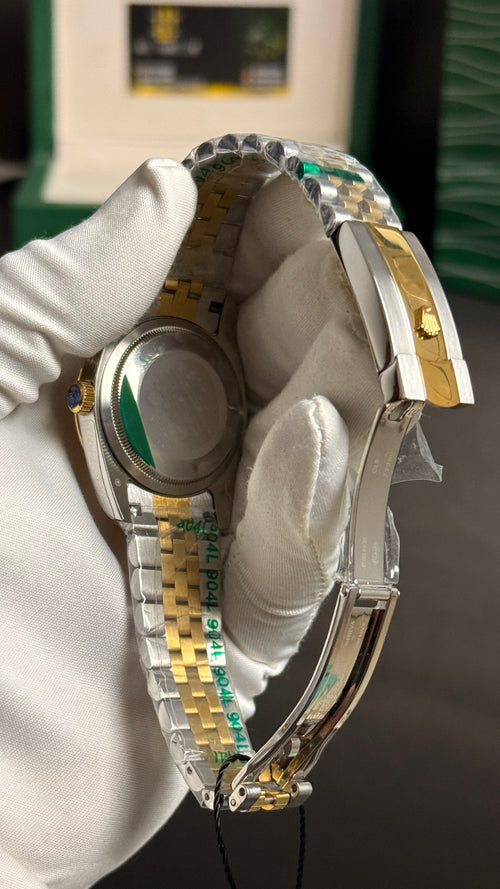 (36 mm) Yellow gold tow tone with Beauty Dial.