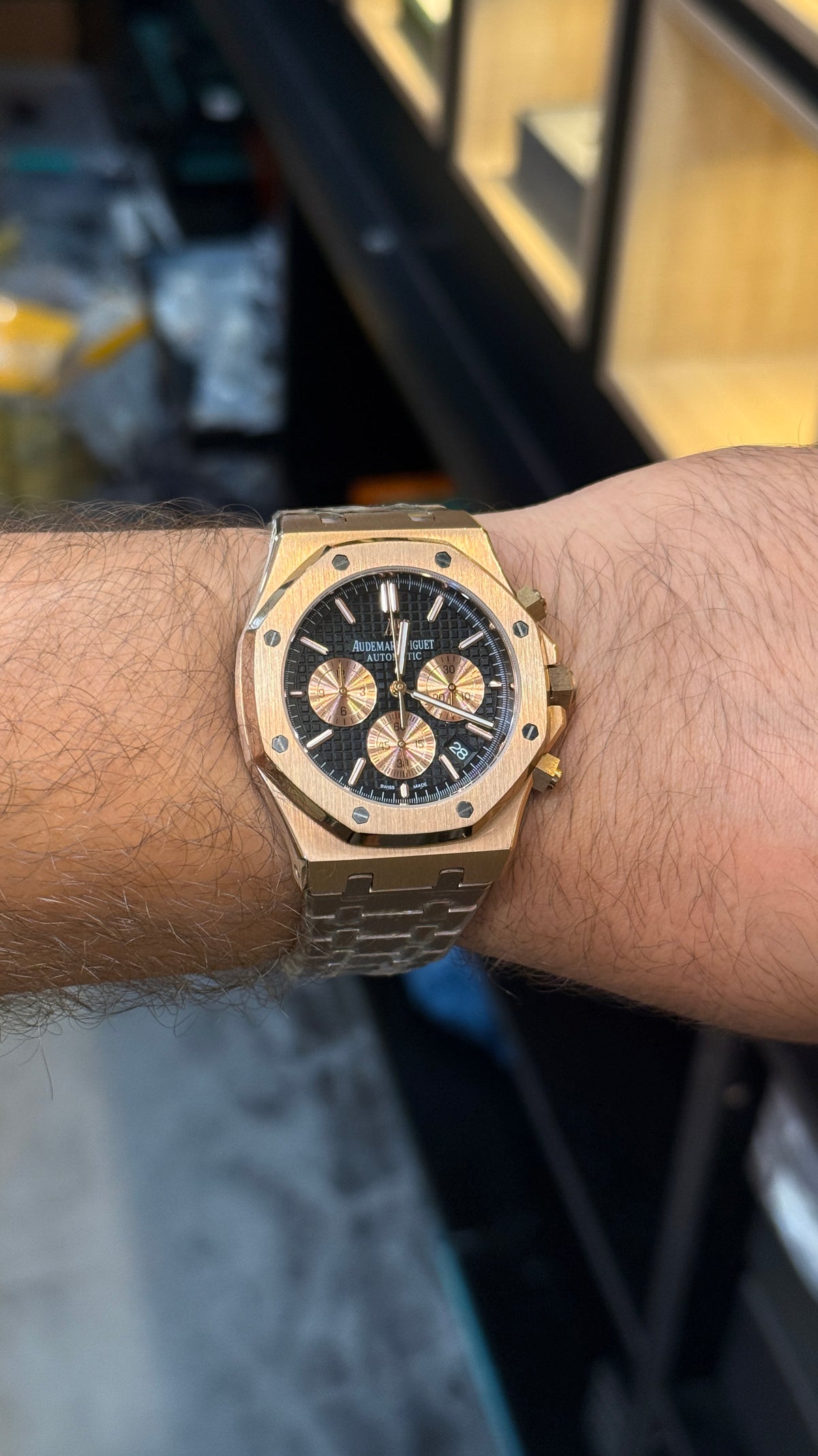 Rose gold with black Dial.