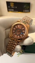 Rose gold with chocolate Dial