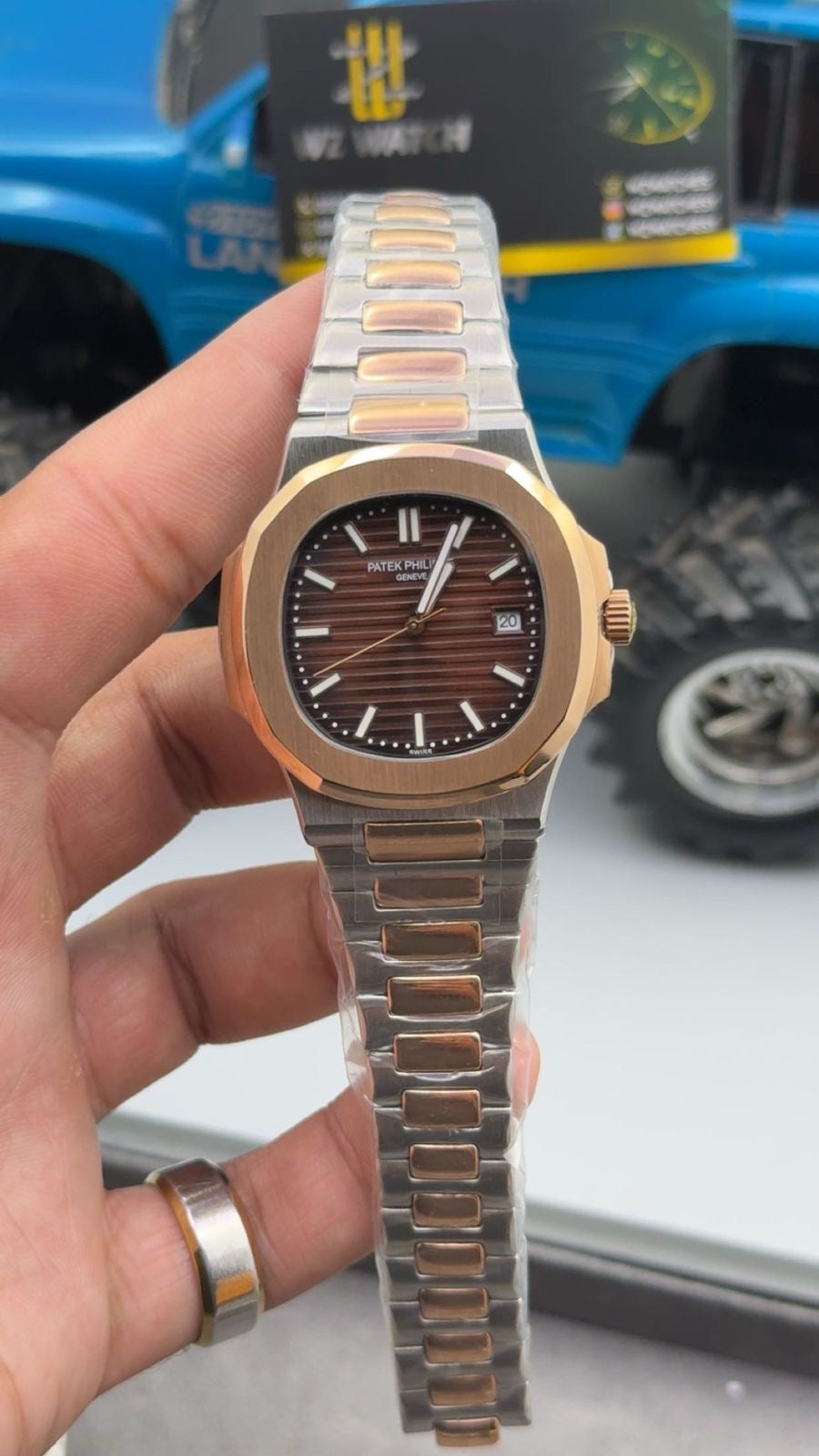 Rose gold two tone with chocolate Dial.