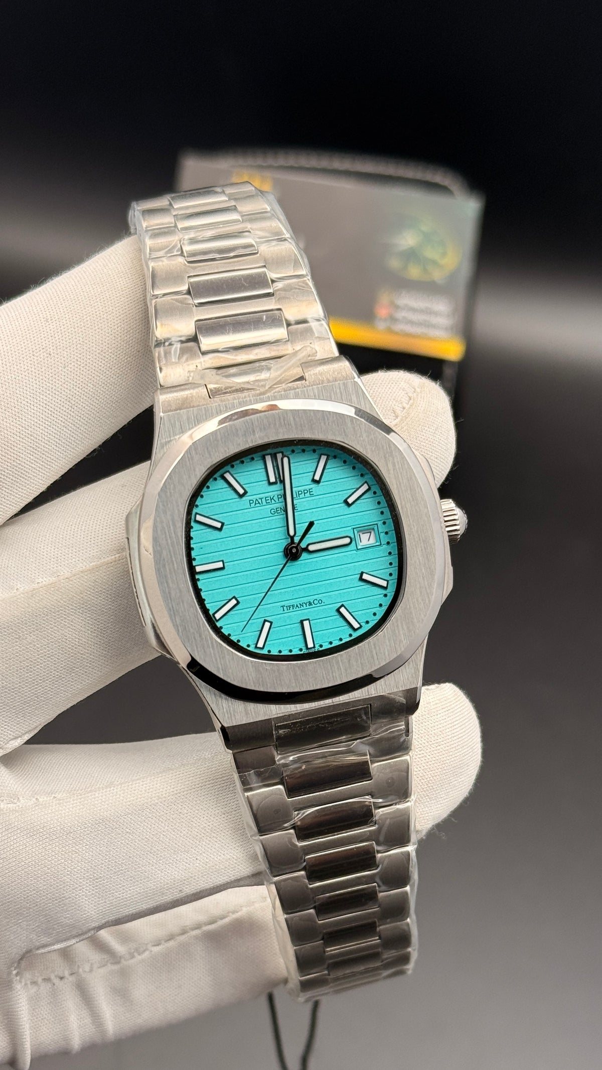 Silver with tiffany Dial.