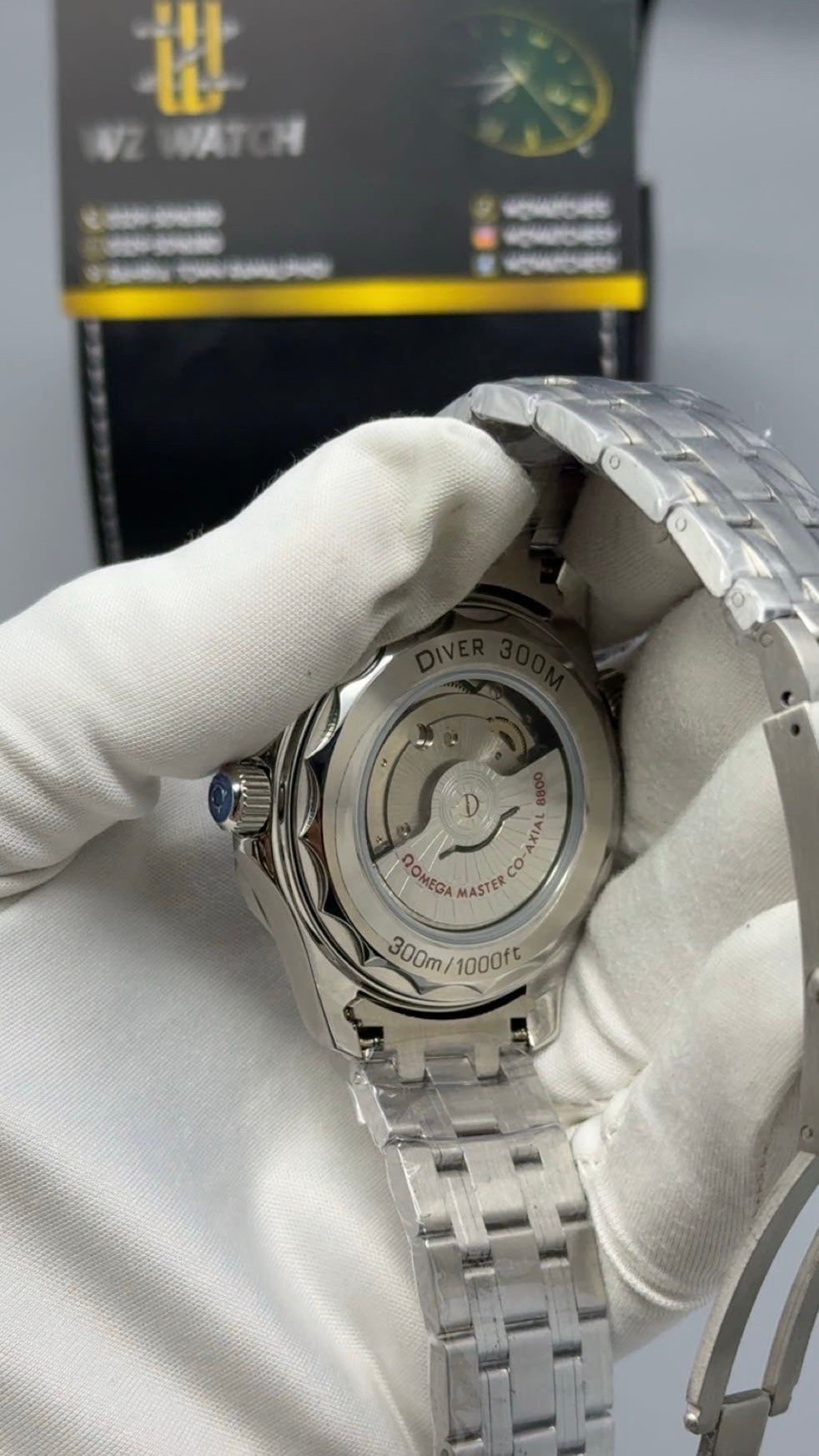 Silver with blue Dial.