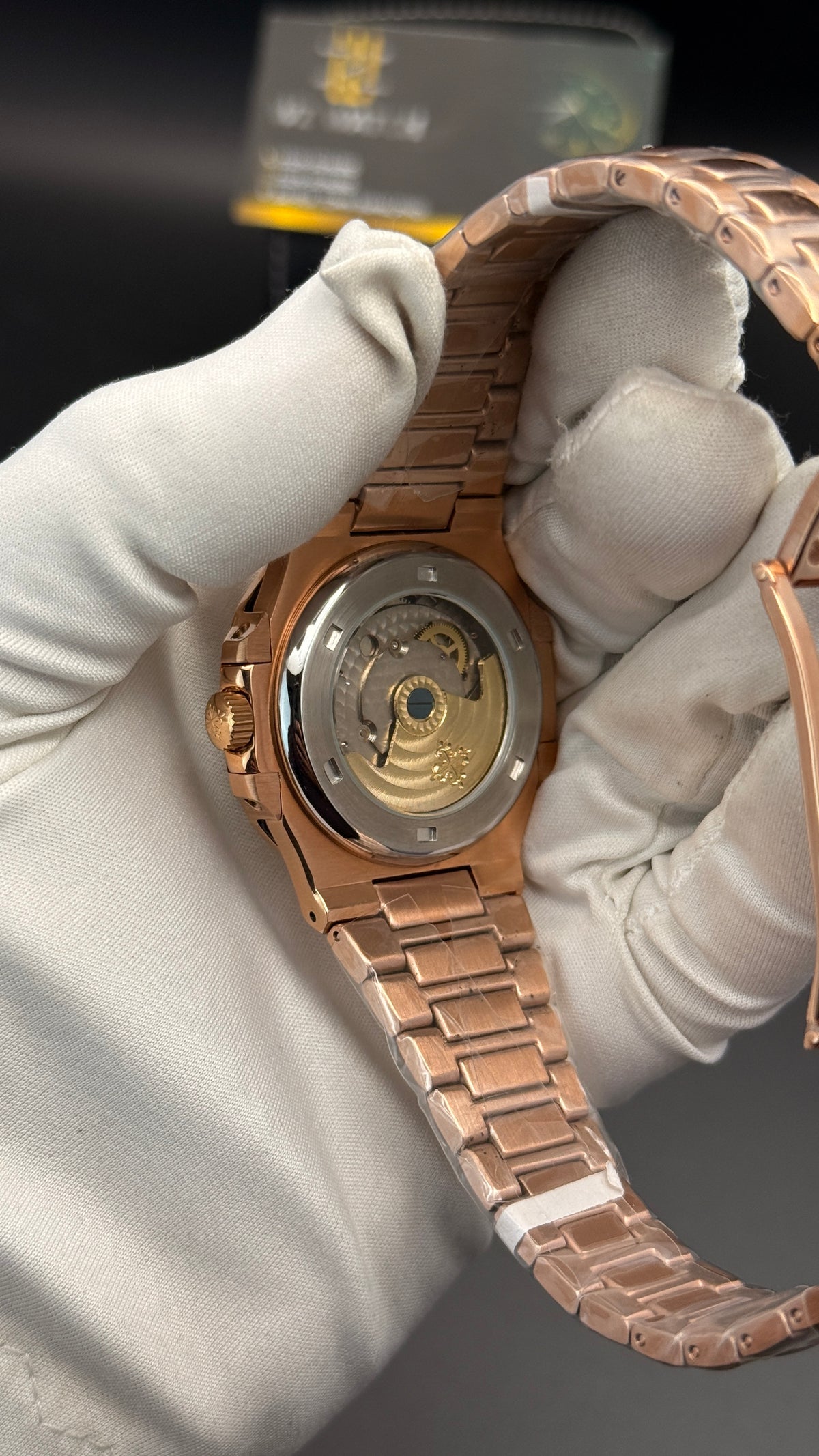 Rose gold with green Dial.