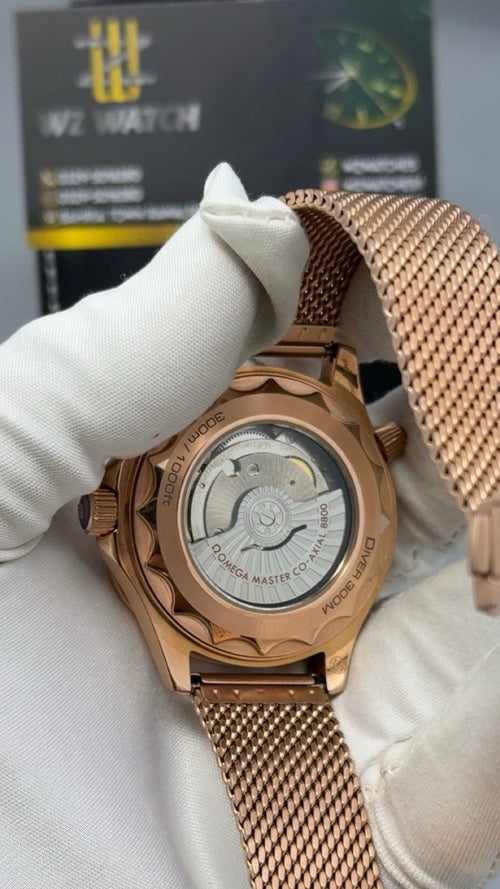 Rose Gold with Black Dial.