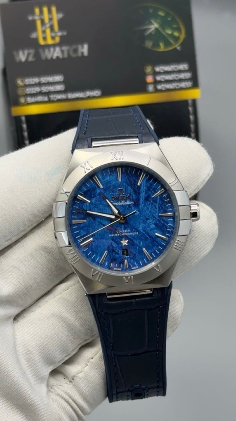 Silver with blue Dial.