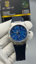 Silver with blue Dial.