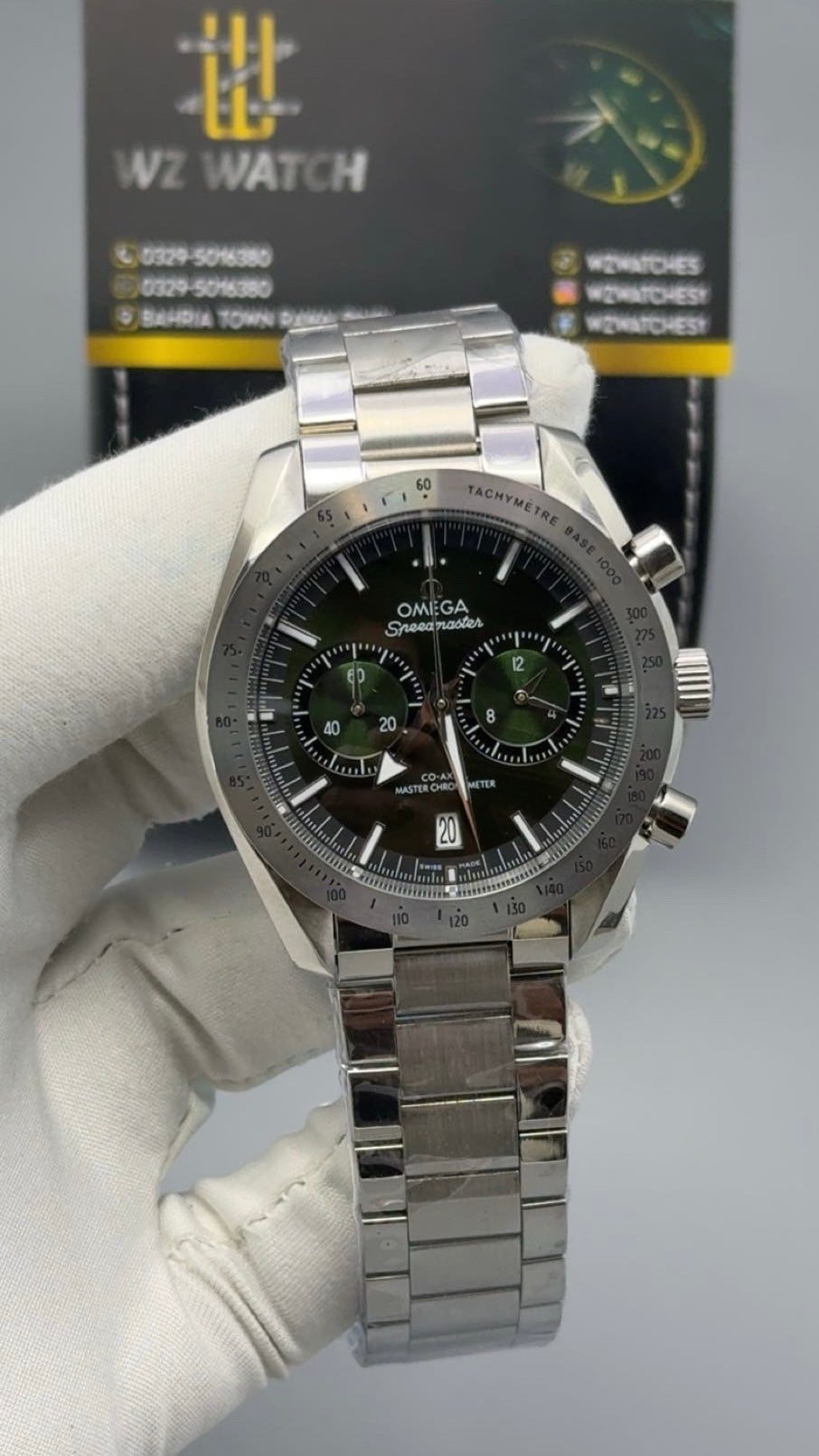 Silver with green Dial.