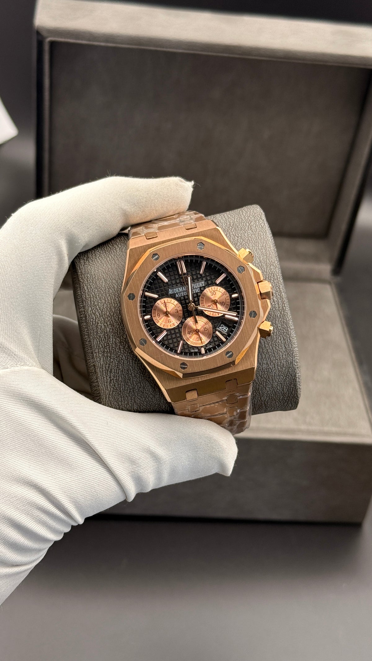 Rose gold with black Dial.