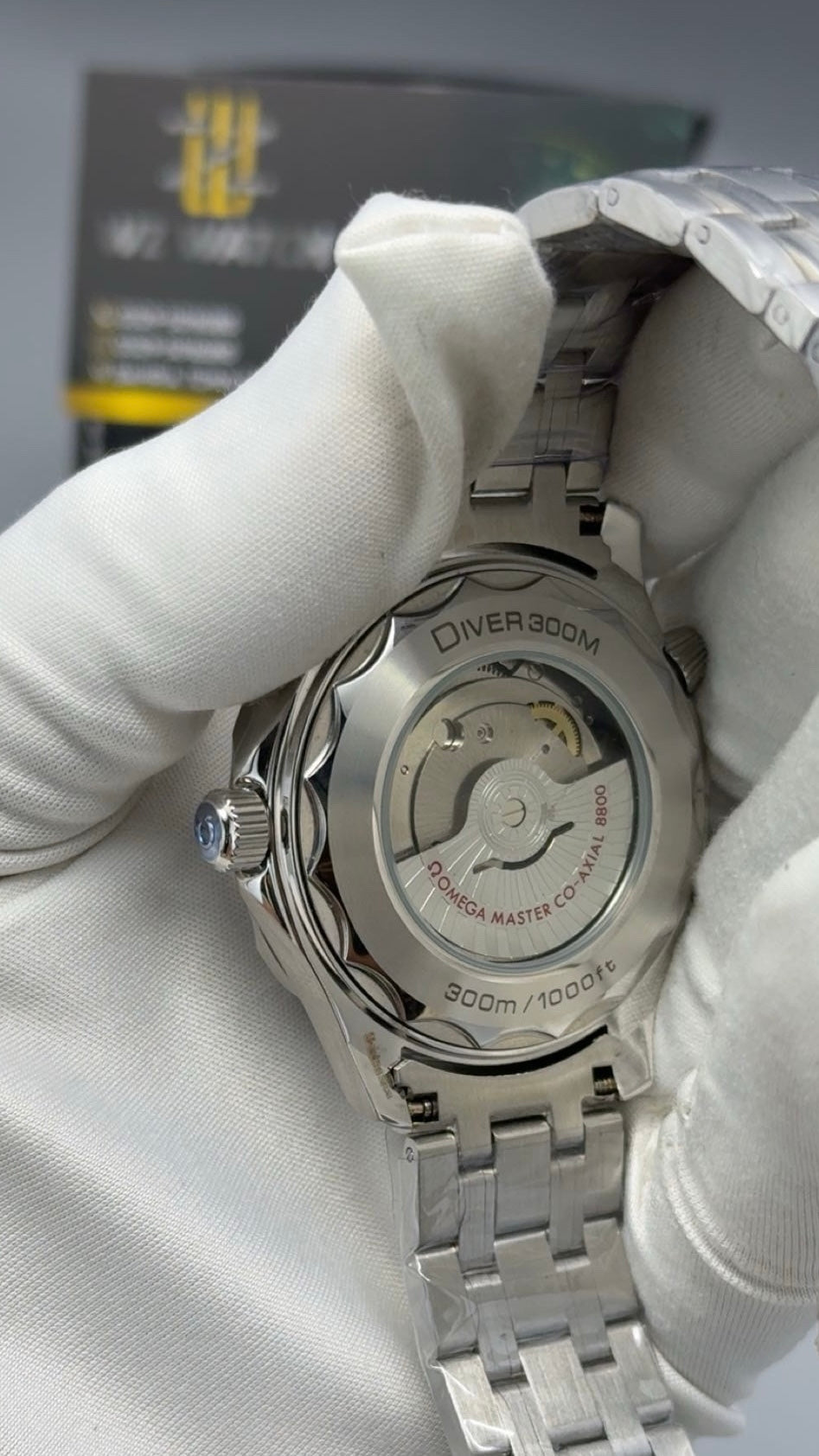 Silver with white  Dial.
