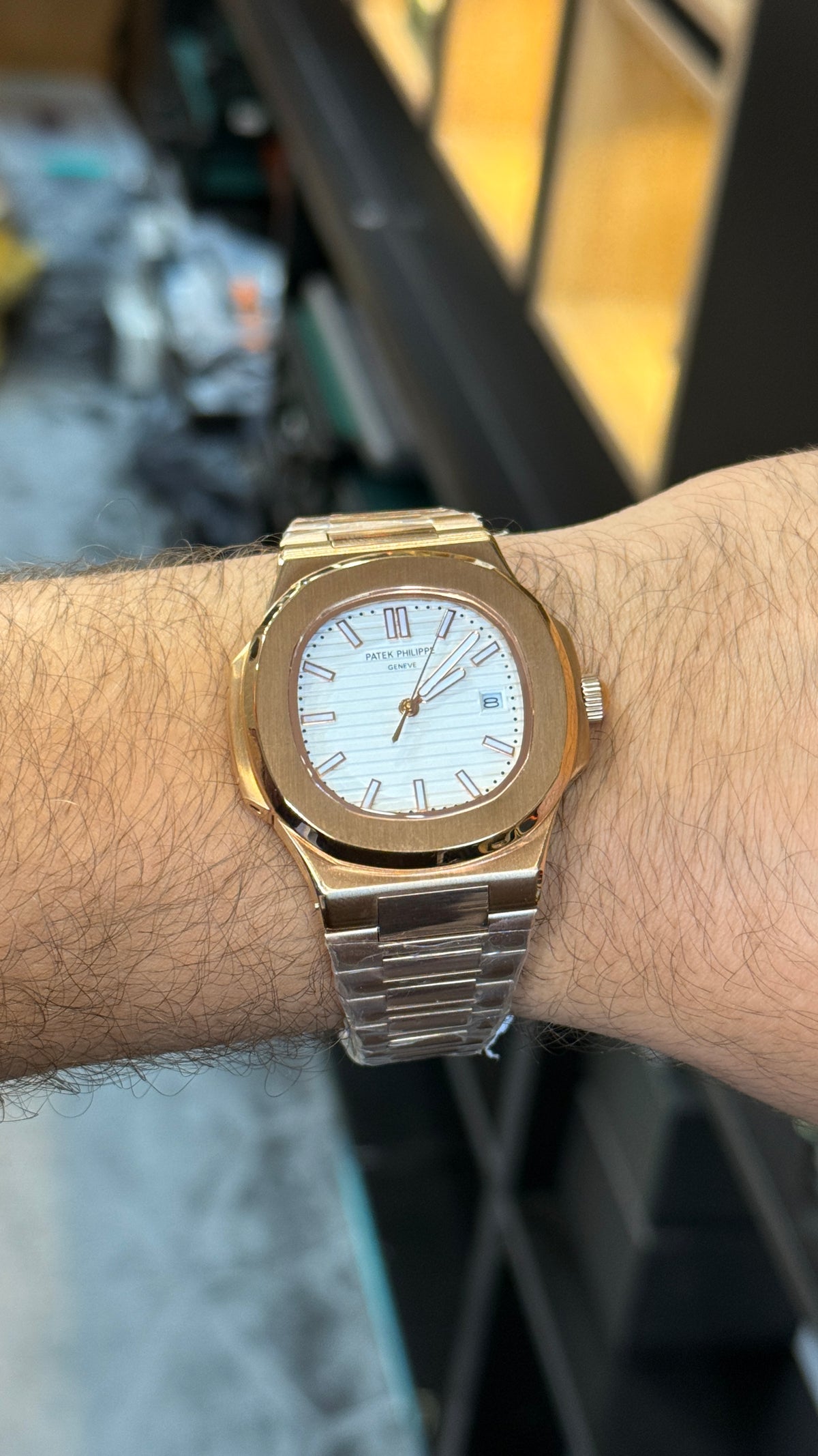 Rose gold with white Dial.