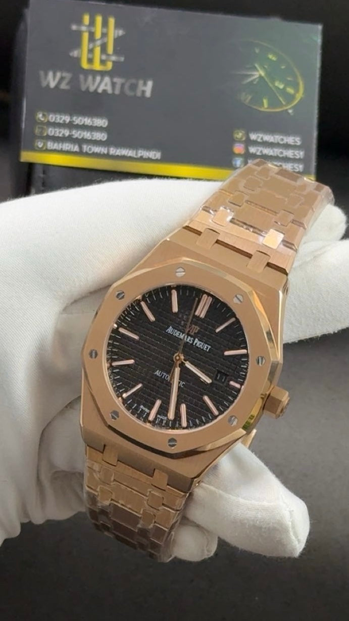Rose gold with black dial