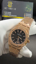 Rose gold with black dial